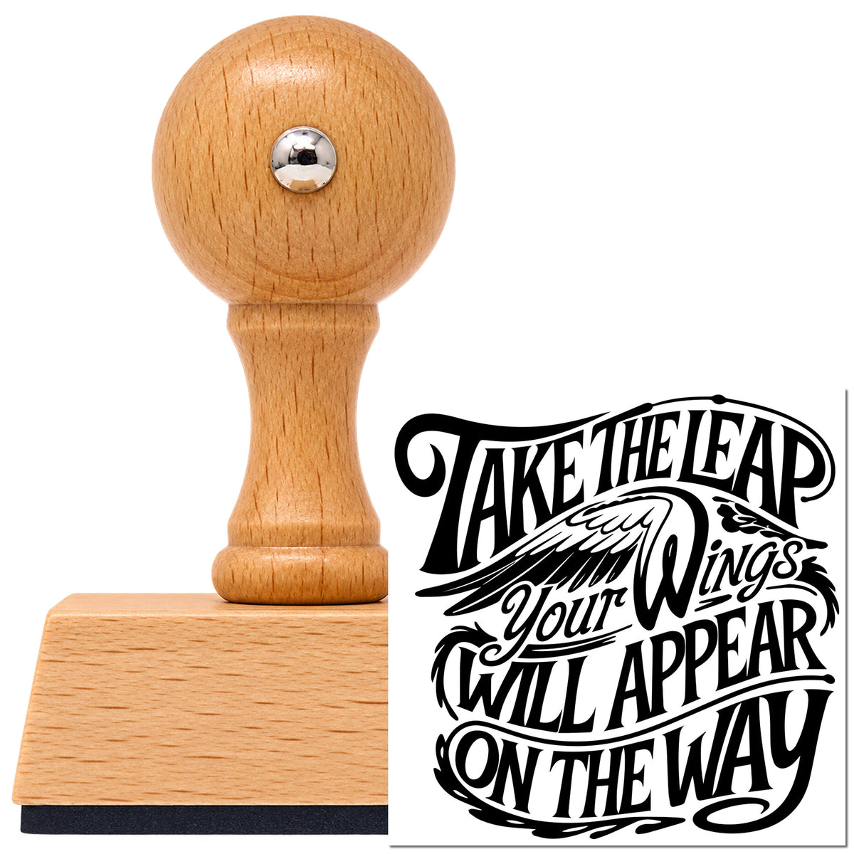 Take The Leap Your Wings Will Appear On The Way Vintage Pro rubber stamp in European beech wood with a round knob handle, shown beside its black imprint.