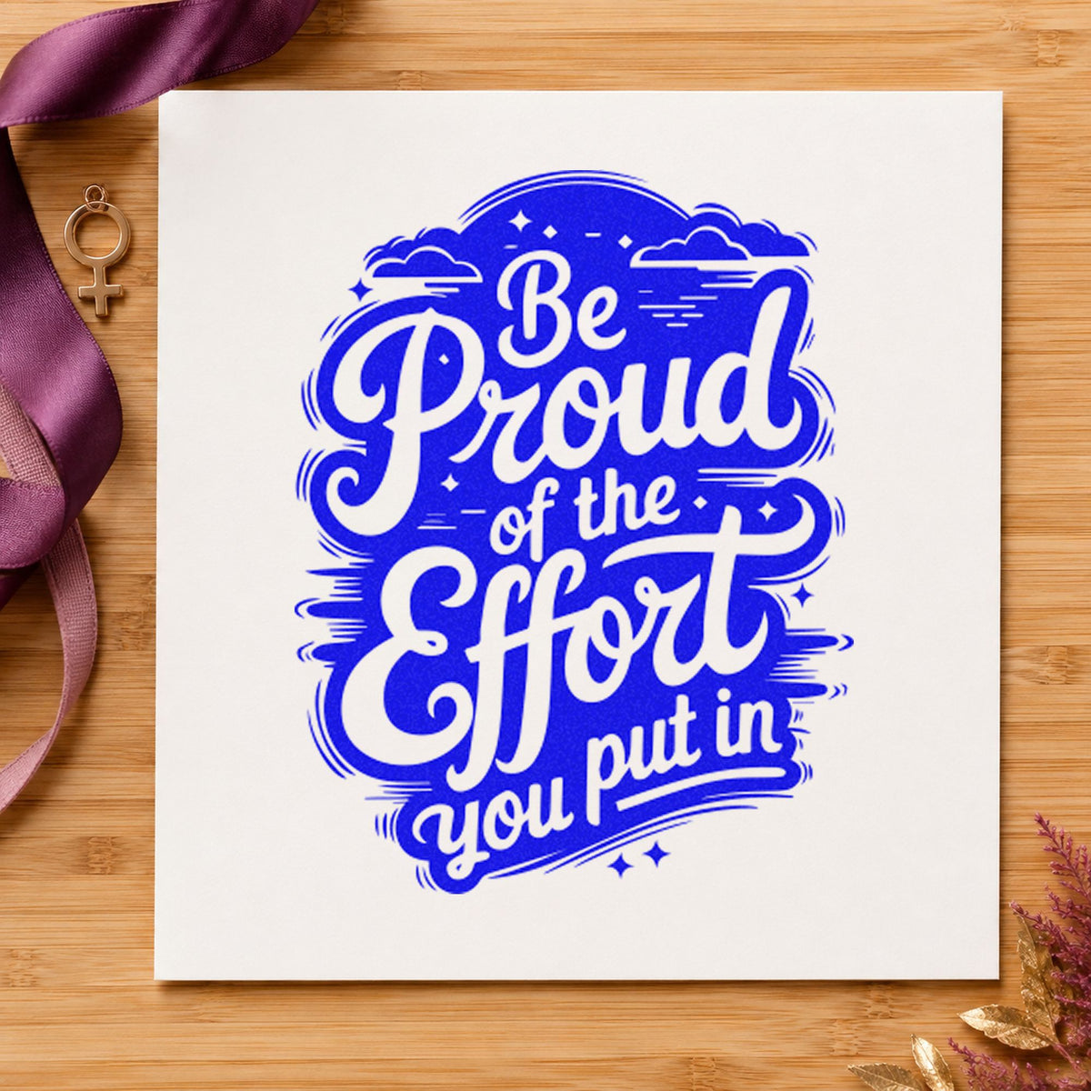 Be Proud Your Effort craft stamp in blue ink on cardstock, an easy option for team sash printing.