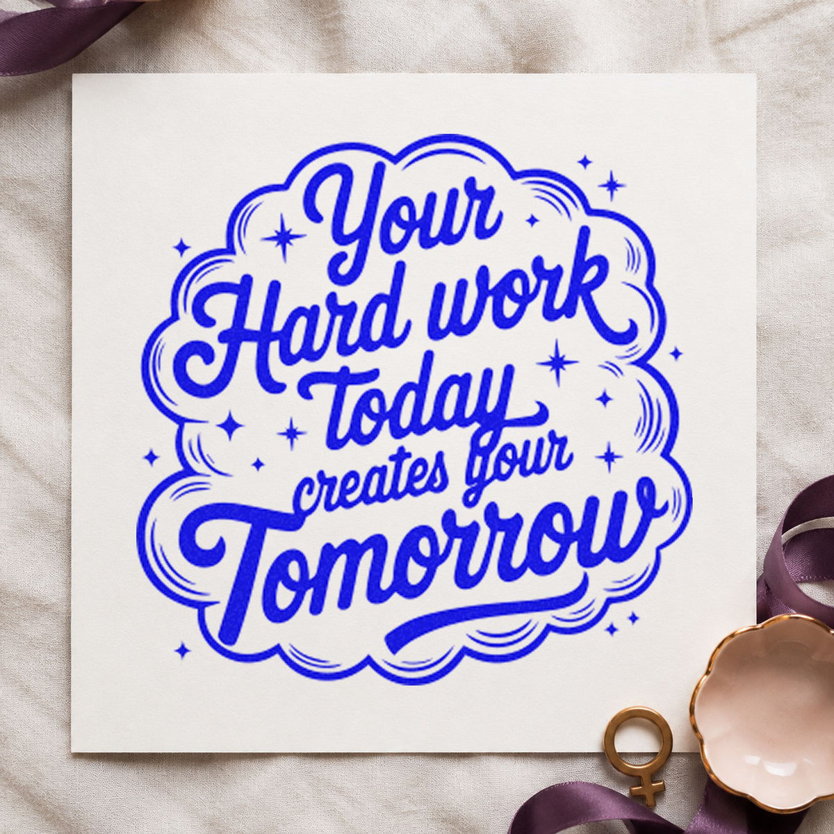 Hard Work Creates Tomorrow craft stamp in blue ink on cardstock, an easy option for laundry bag printing.