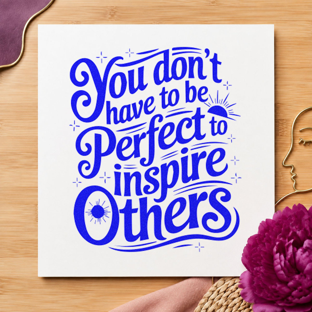 Inspire Others Without Perfection craft stamp imprinted in blue ink on paper, a design suited to framed garage shelf.