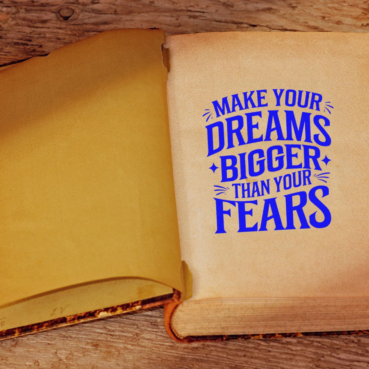 Dreams Bigger Than Fears rubber stamp shown in blue ink, stamped for projects such as rodeo album page.