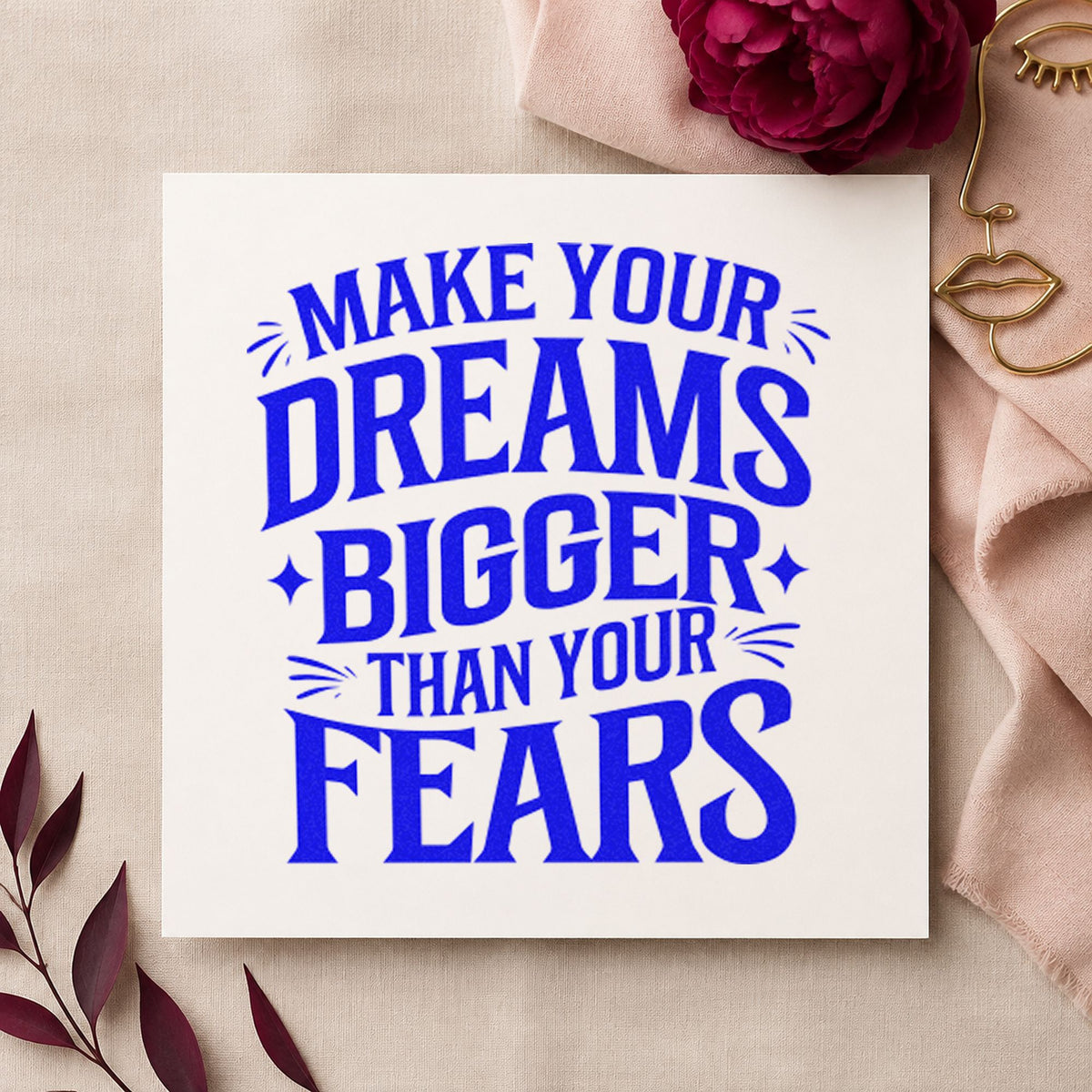 Dreams Bigger Than Fears craft stamp in blue ink on cardstock, an easy option for saddle pad printing.