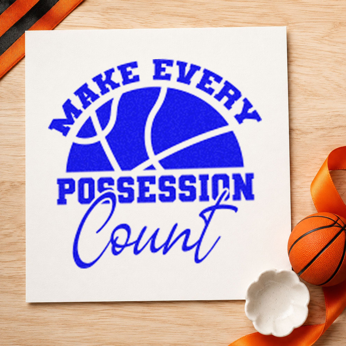 Every Possession Count Basketball craft stamp imprinted in blue ink on paper, a design suited to framed hotel lobby.