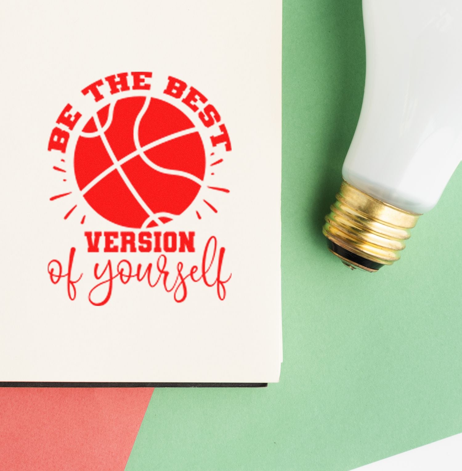 Custom rubber stamp impression with basketball graphic and Be the Best Version of Yourself motivational message on paper.