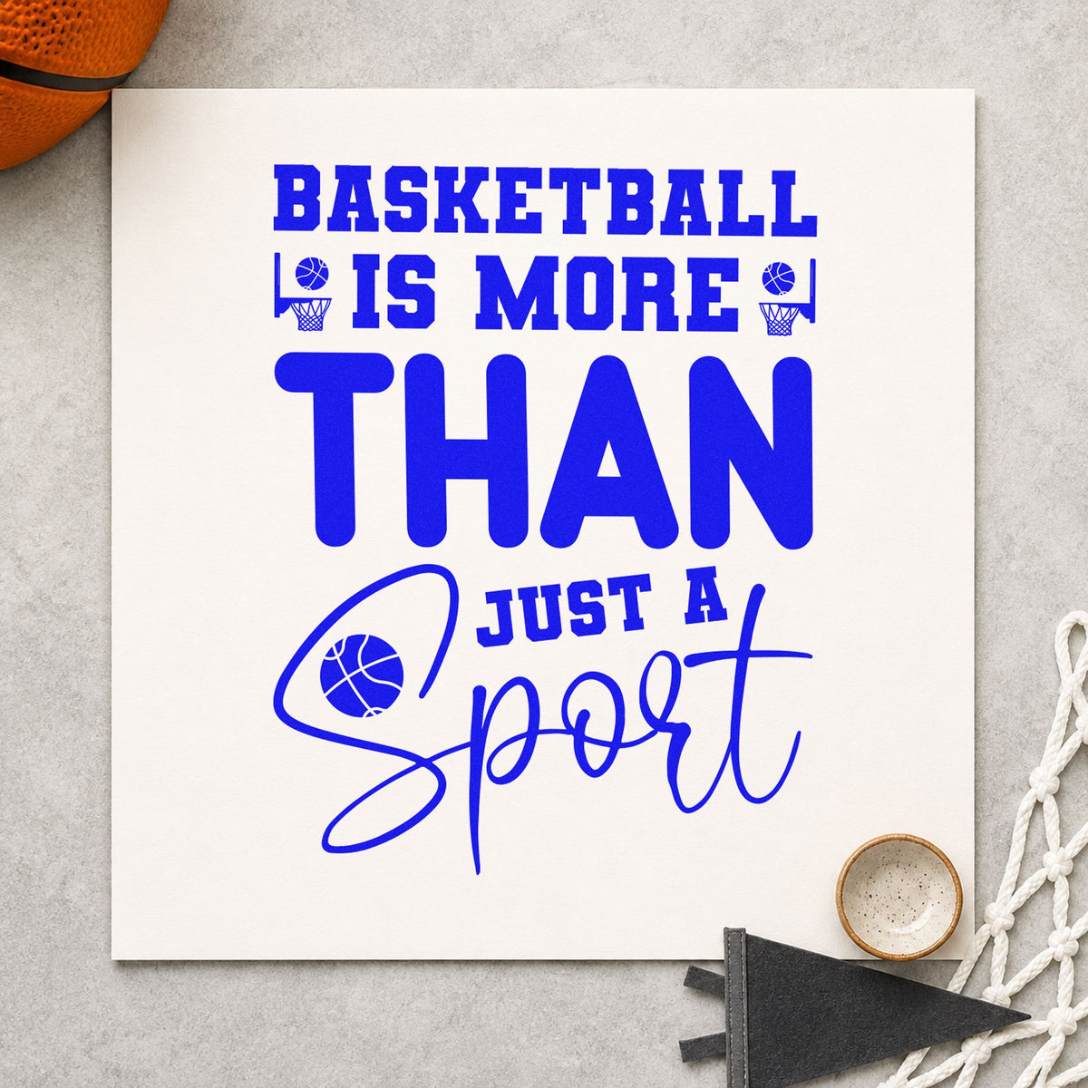 Basketball More Than Sport craft stamp in blue ink on cardstock, an easy option for team tee printing.