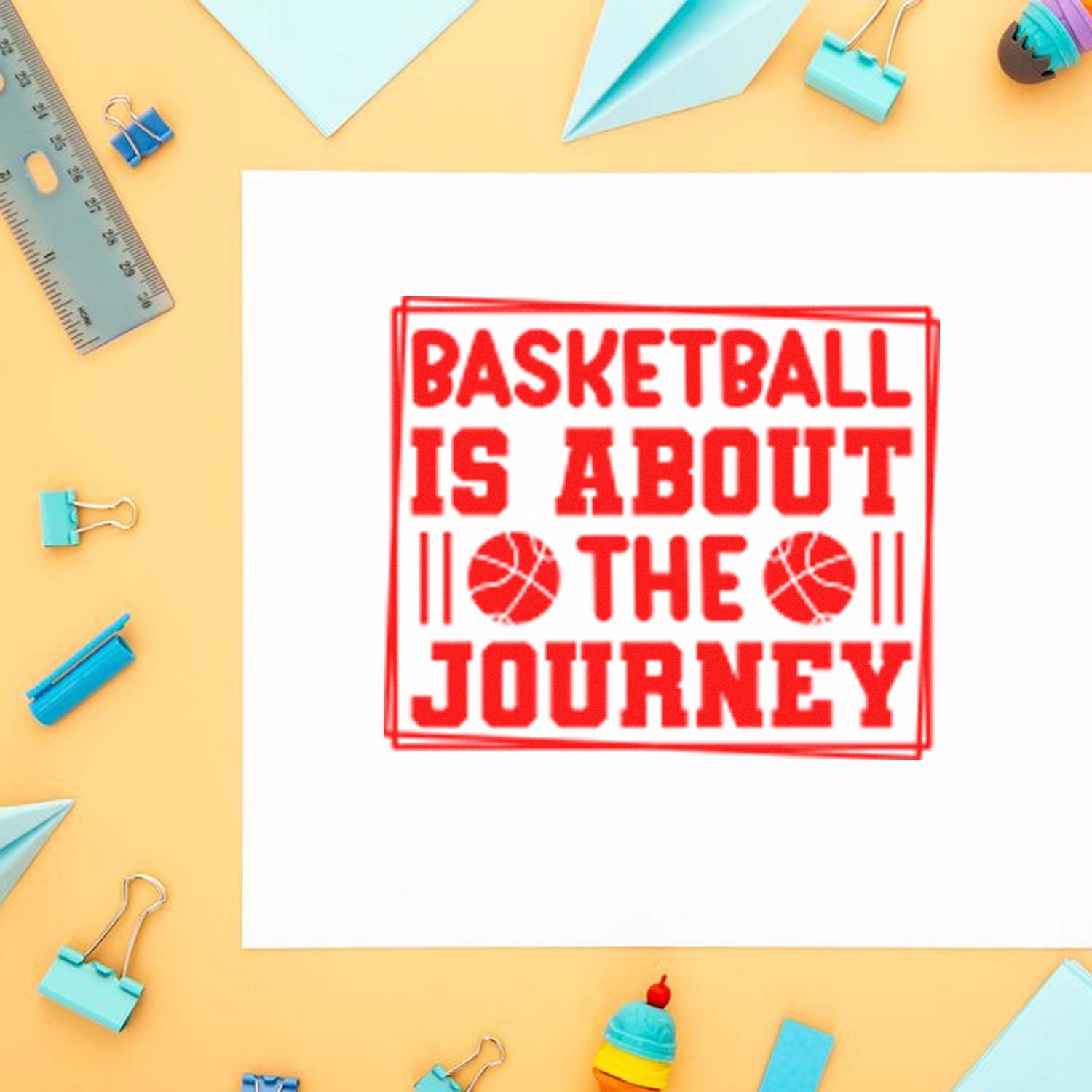 Basketball is about the journey custom rubber stamp impression on paper, with craft supplies around it.