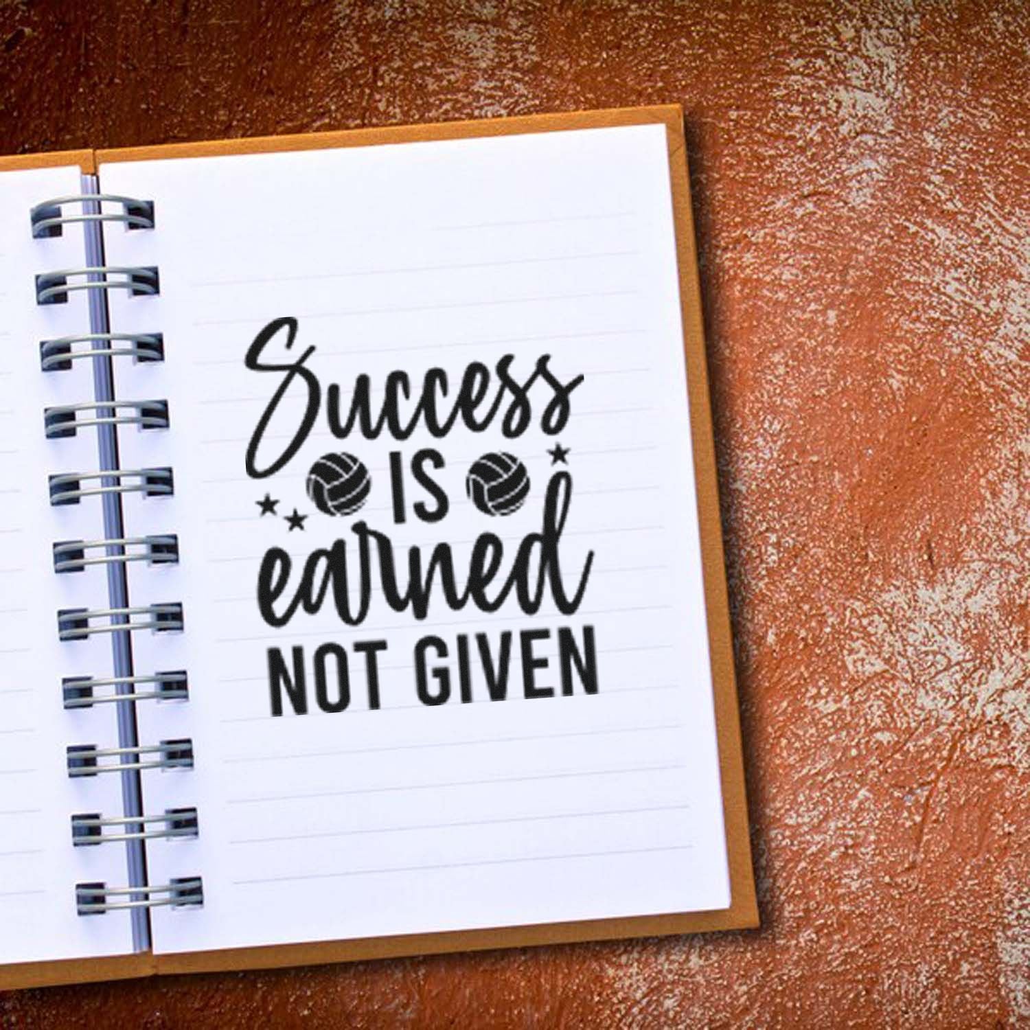 Motivational rubber stamp design reading Success is earned not given for notebooks, planners, and handmade crafts.