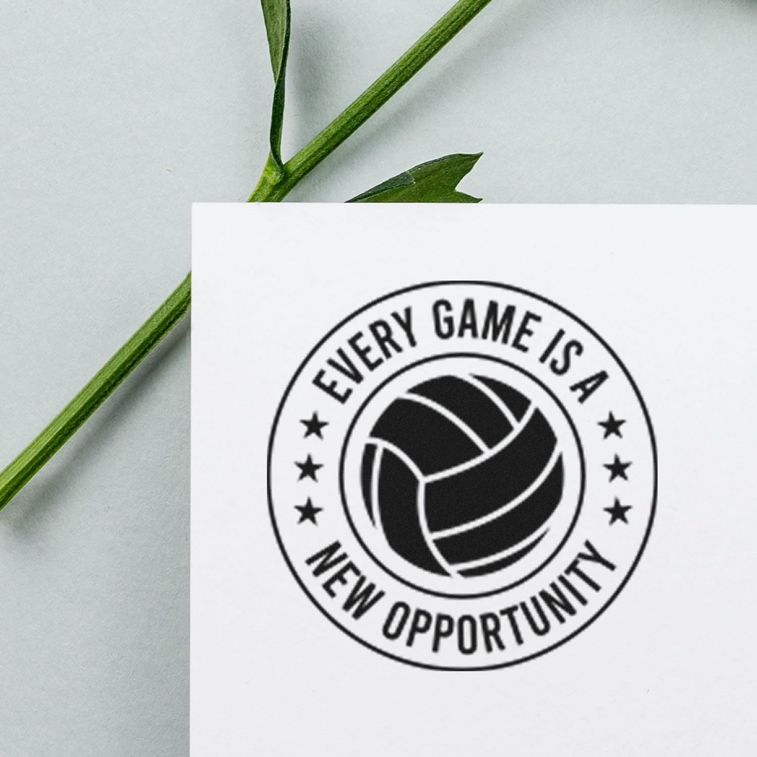 Volleyball rubber stamp with Every Game Is a New Opportunity quote for sports team branding.