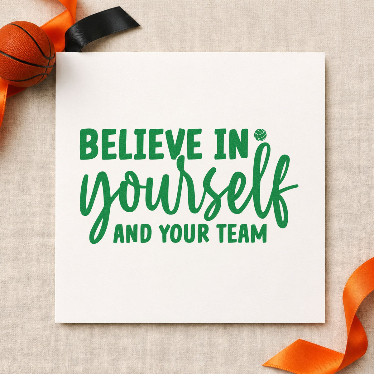 Believe Yourself And Team craft stamp imprint in green ink on a handmade project, one idea being seat swap cards.