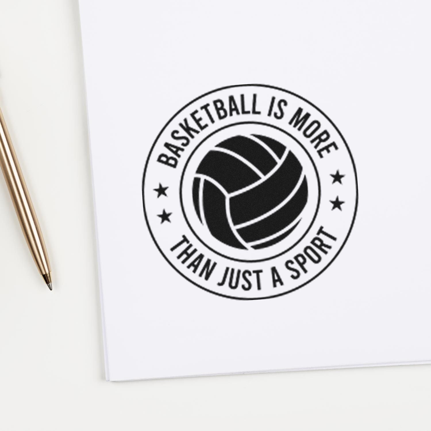Custom rubber stamp impression with sports ball logo and slogan Basketball Is More Than Just a Sport on paper.