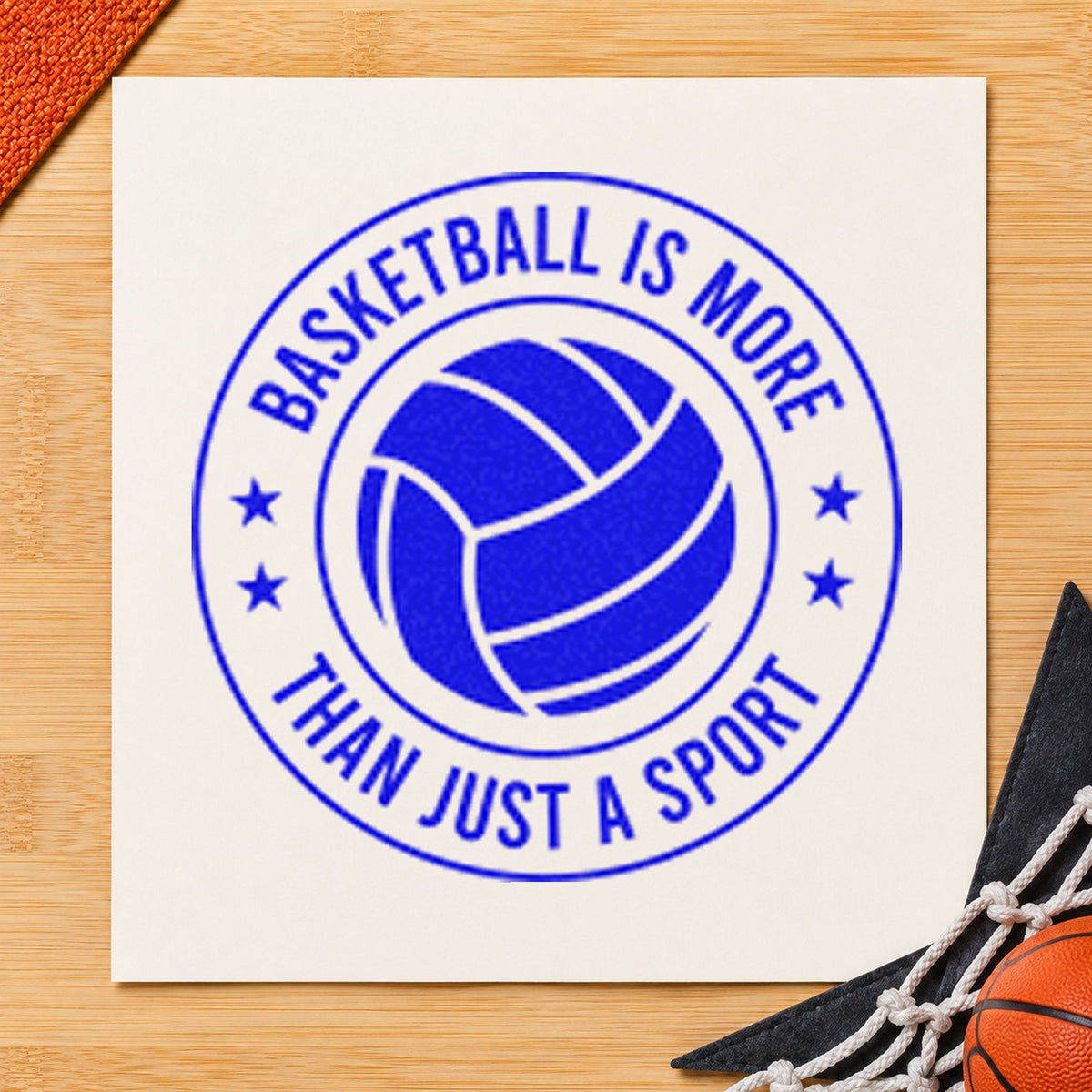 Basketball More Than Sport craft stamp imprinted in blue ink on paper, a design suited to framed gym entry.