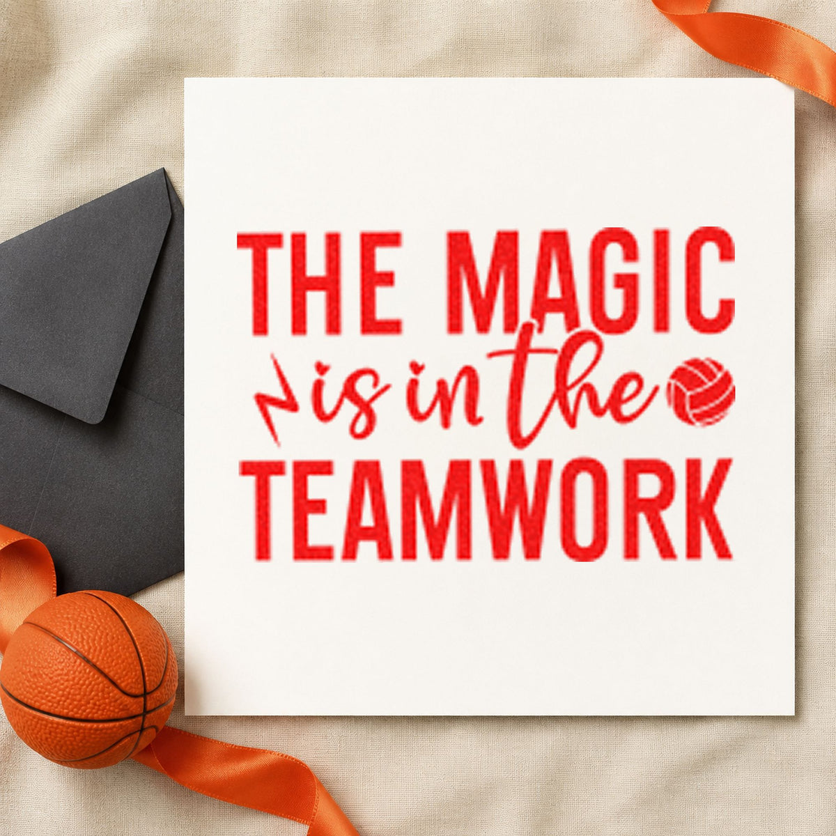 Magic Is In Teamwork rubber stamp shown in red ink, stamped for projects such as bin flag labels.
