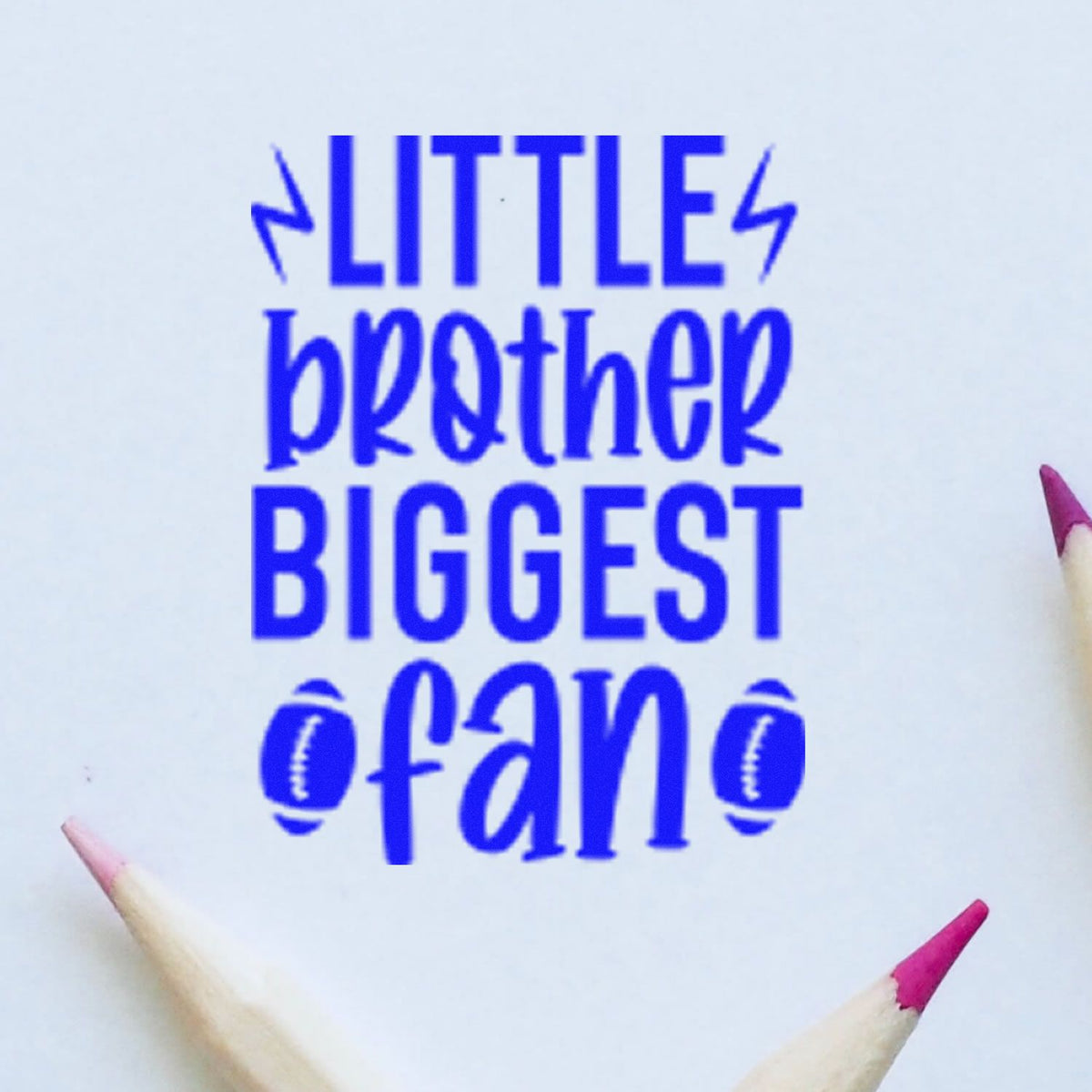 Little Brother Biggest Fan rubber stamp shown in blue ink, stamped for projects such as game day album page.