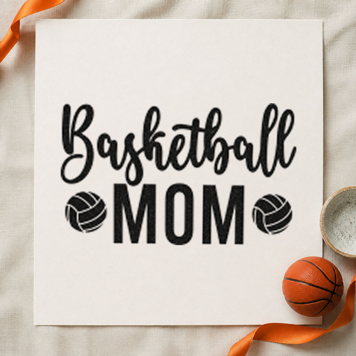Basketball Mom Paneled Balls craft stamp imprint in black ink on a handmade project, one idea being kit bag gift tags.