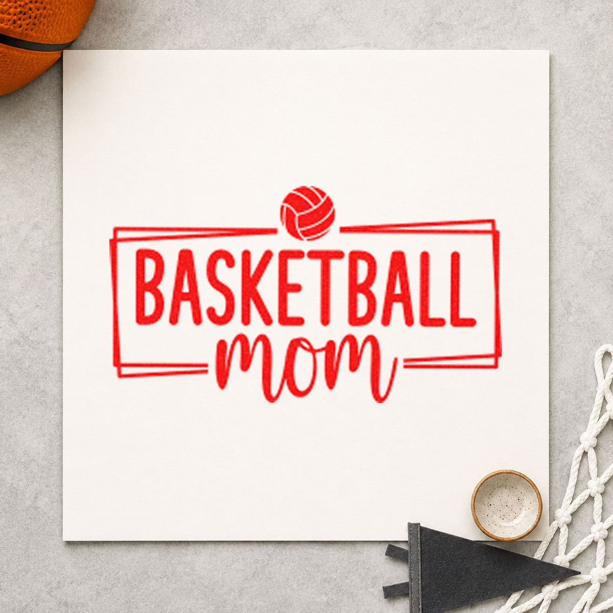 Basketball Mom Rectangular Frame rubber stamp shown in red ink, stamped for projects such as bin travel labels.