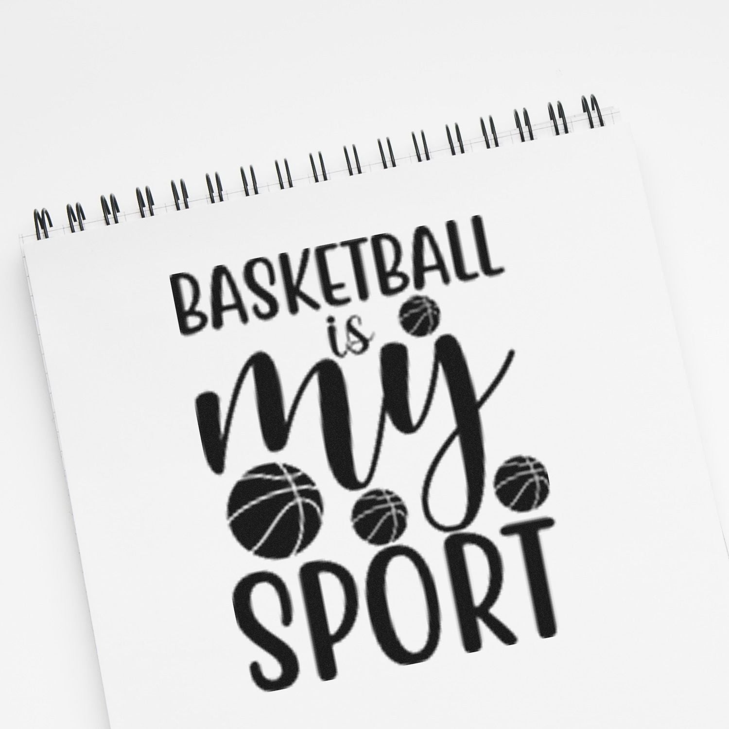 Basketball is my sport rubber stamp design with basketball icons on a spiral notebook page