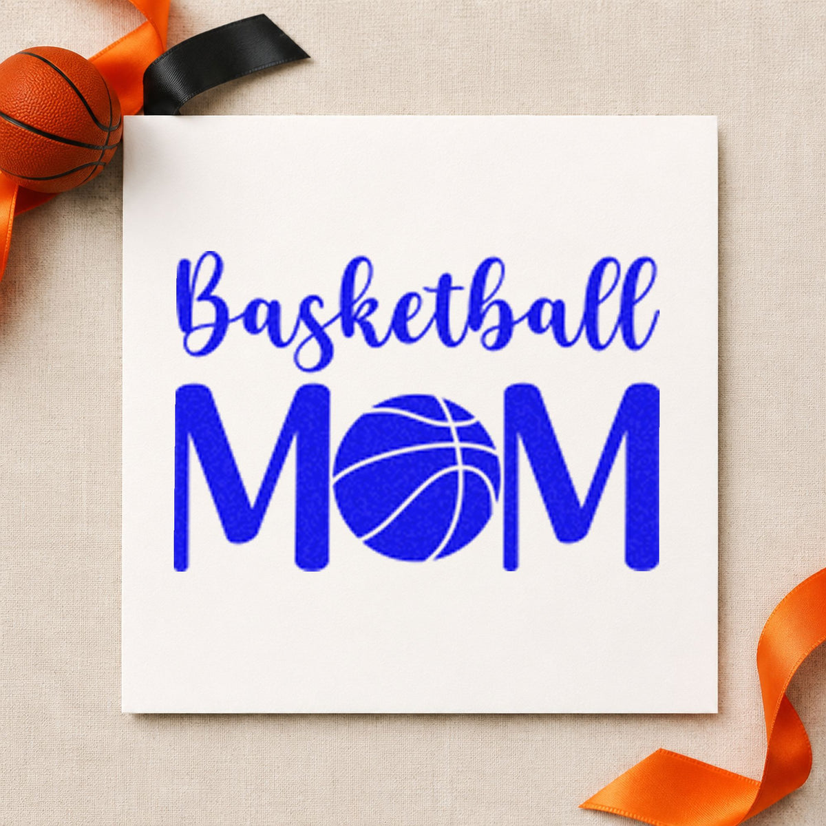 Basketball Mom Ball Letter craft stamp imprinted in blue ink on paper, a design suited to framed back door.