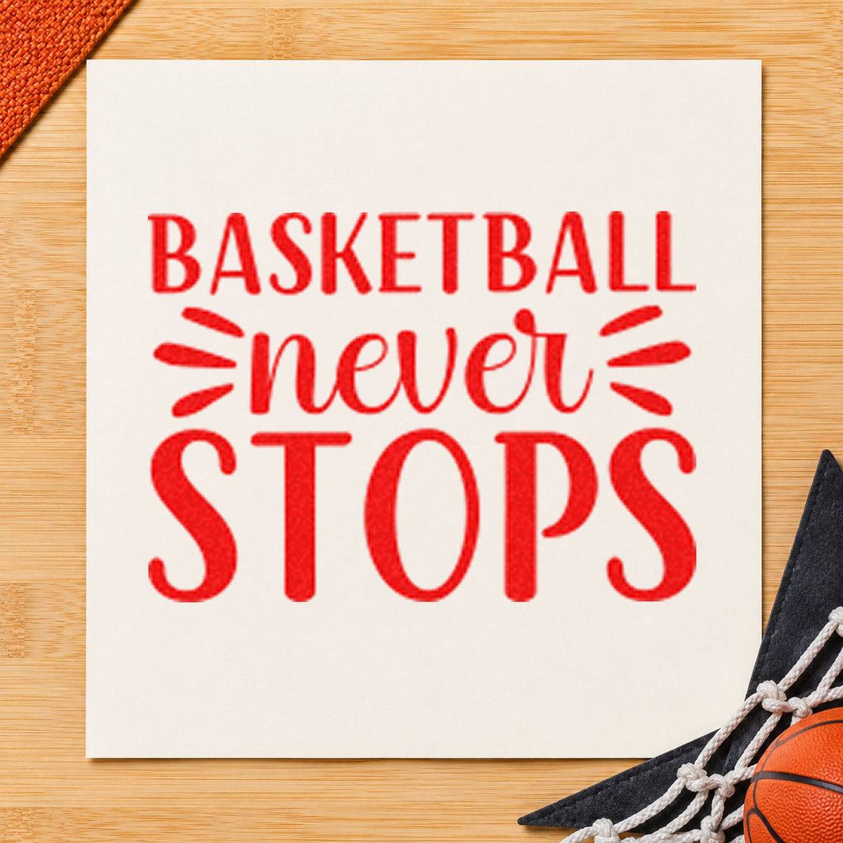 Basketball Never Stops Lettering rubber stamp shown in red ink, stamped for projects such as bin block labels.
