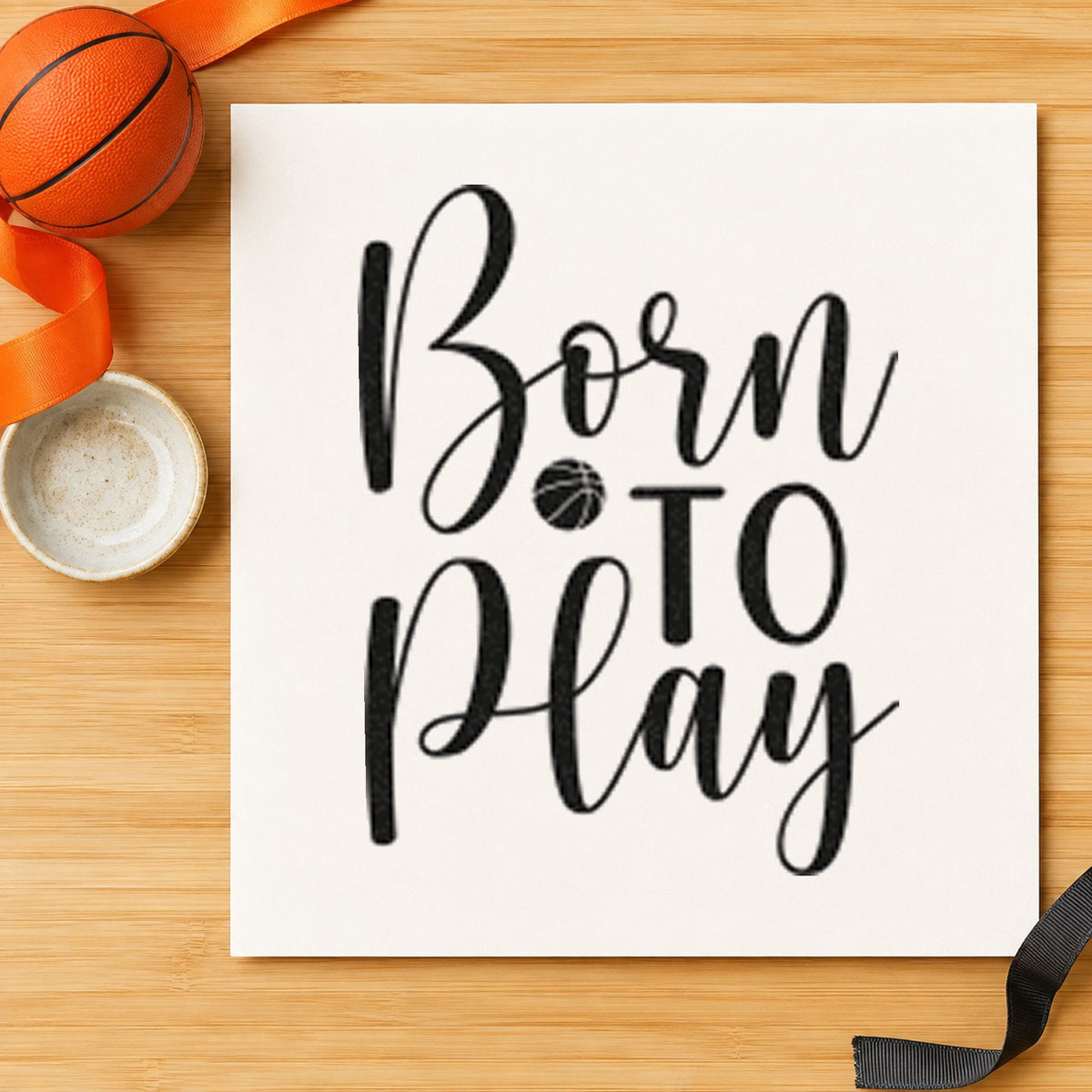 Born To Play Basketball craft stamp imprint in black ink on a handmade project, one idea being baby gift tags.