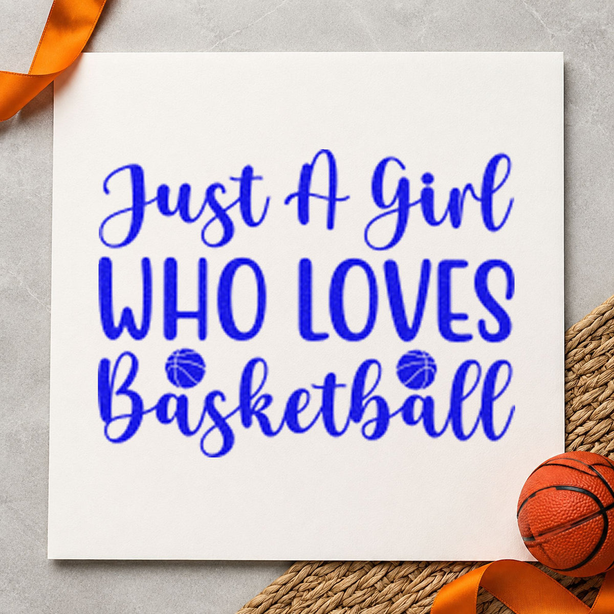 Girl Who Loves Basketball craft stamp in blue ink on cardstock, an easy option for warmup tee printing.
