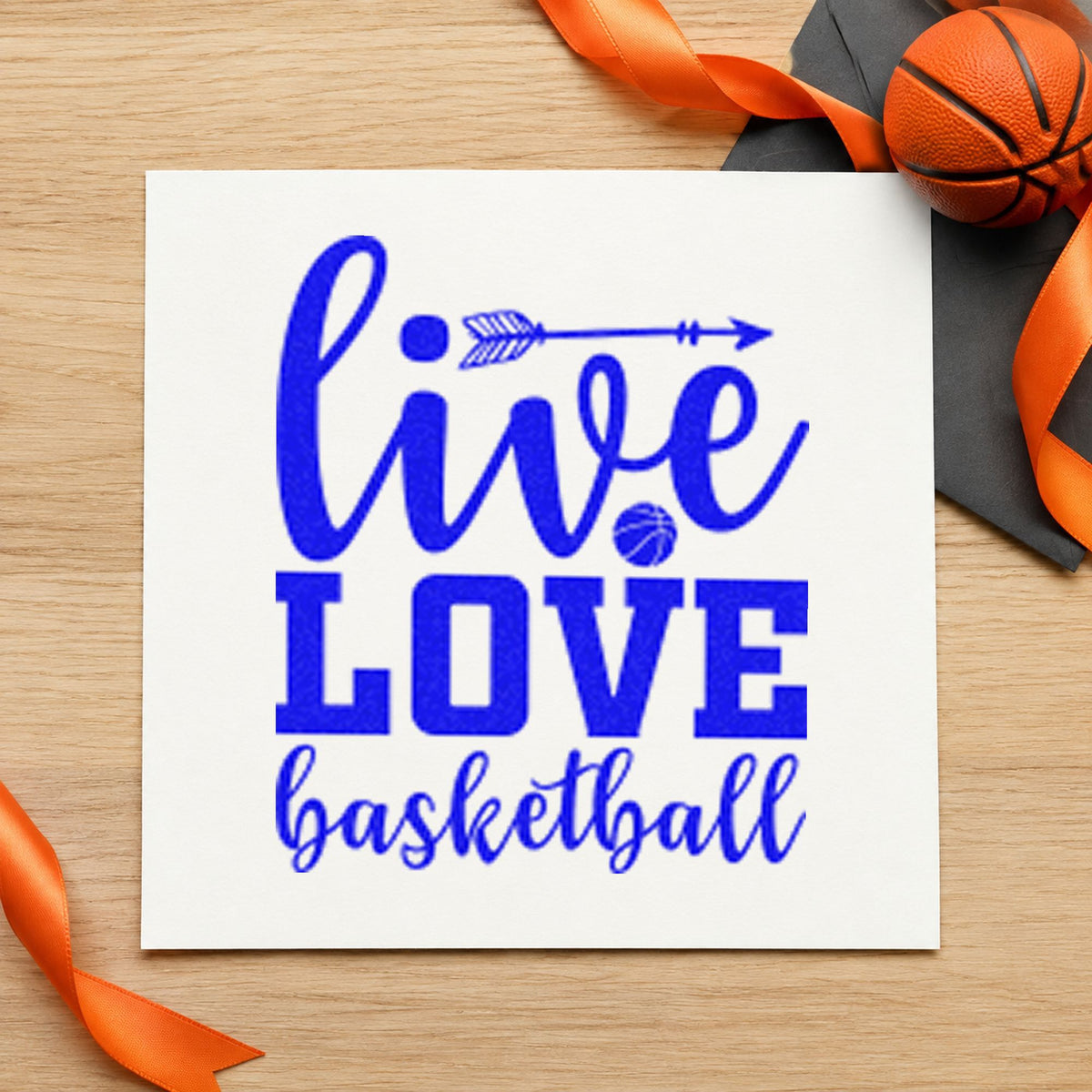Live Love Basketball Arrow craft stamp in blue ink on cardstock, an easy option for stall curtain printing.