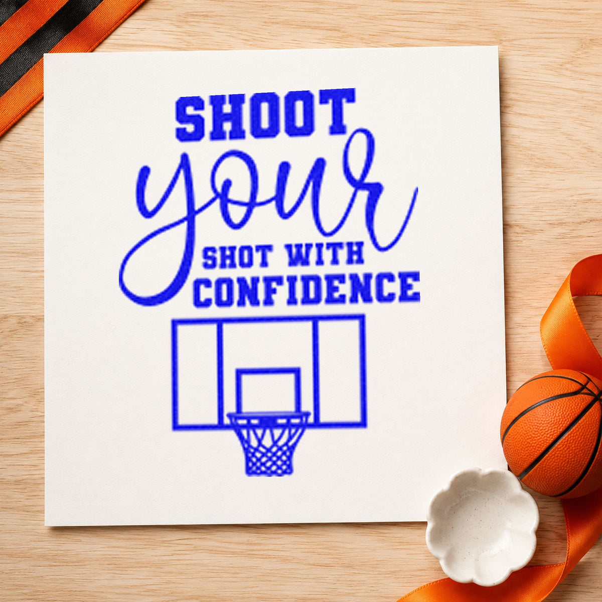 Shoot Shot With Confidence craft stamp in blue ink on cardstock, an easy option for court mat printing.