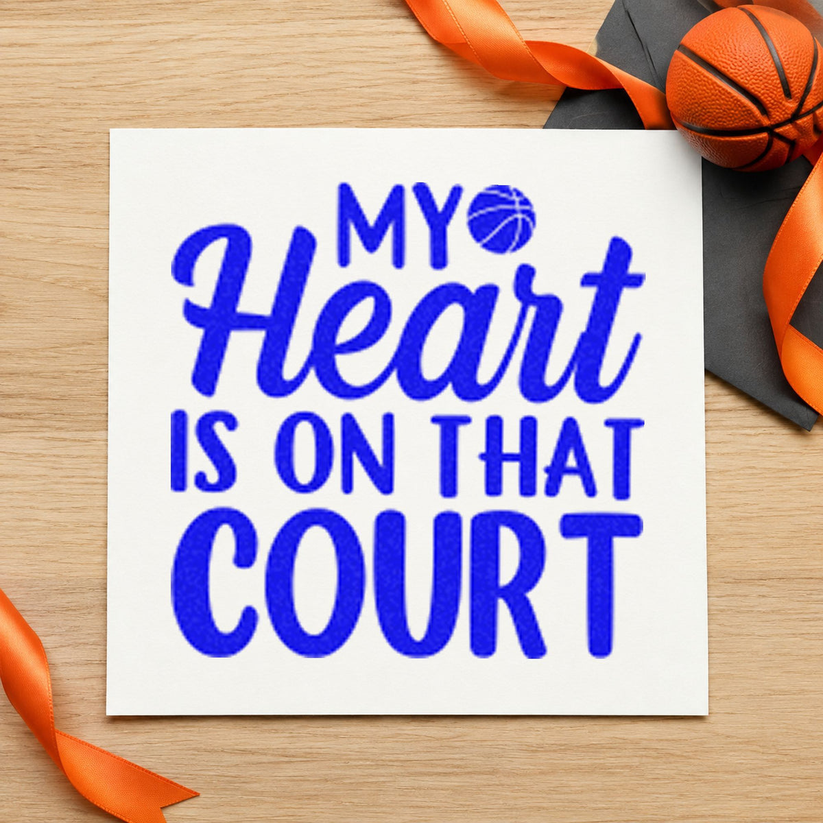 Heart On That Court craft stamp imprinted in blue ink on paper, a design suited to framed living corner.
