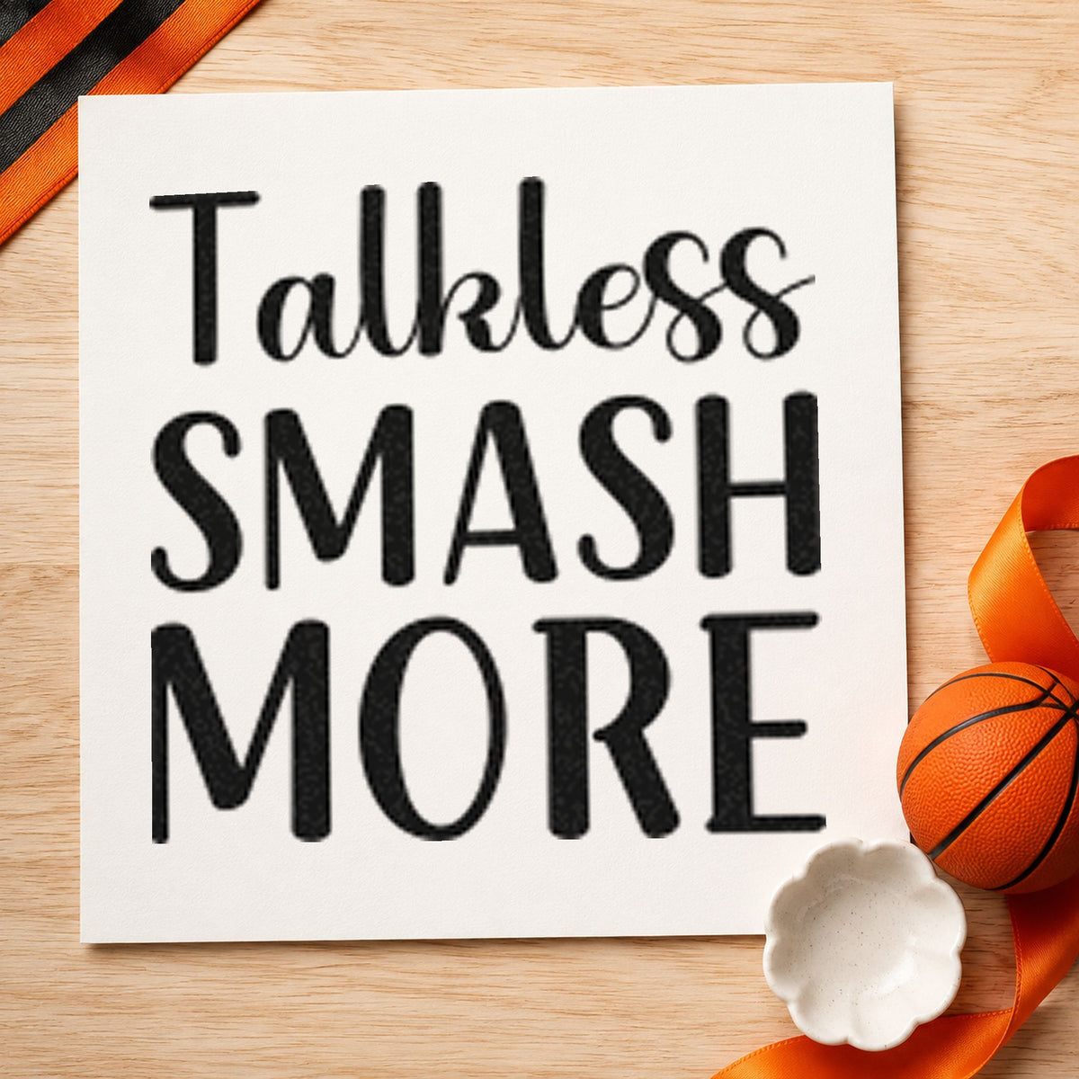 Talk Less Smash More craft stamp imprint in black ink on a handmade project, one idea being ball cart gift tags.