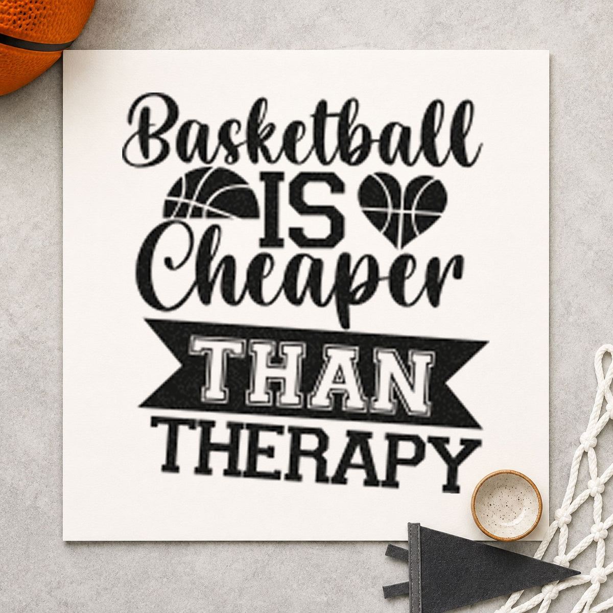 Basketball Cheaper Than Therapy craft stamp imprint in black ink on a handmade project, one idea being post game gift tags.