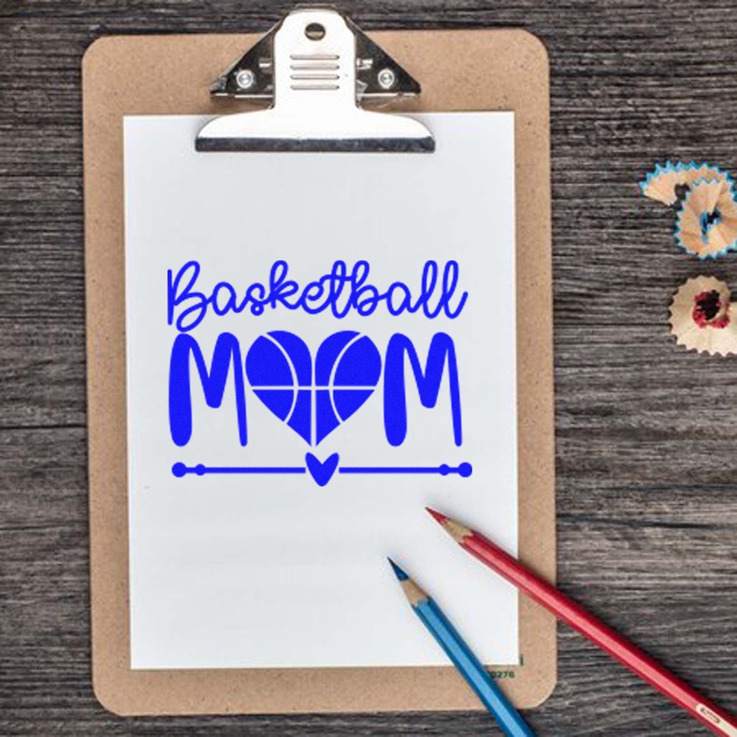 Basketball Mom custom rubber stamp design on clipboard with heart basketball graphic for sports-themed crafts and gifts.