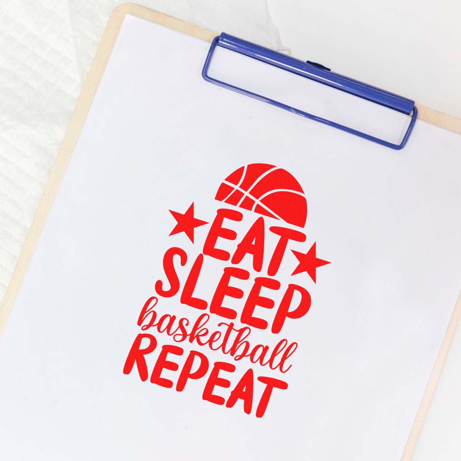Basketball rubber stamp impression with Eat Sleep Repeat slogan for coaches, team gifts, and sports crafts.