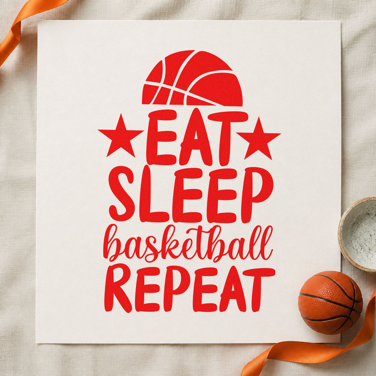 Eat Sleep Basketball Repeat craft stamp imprint in red ink on a handmade project, one idea being day plan cards.