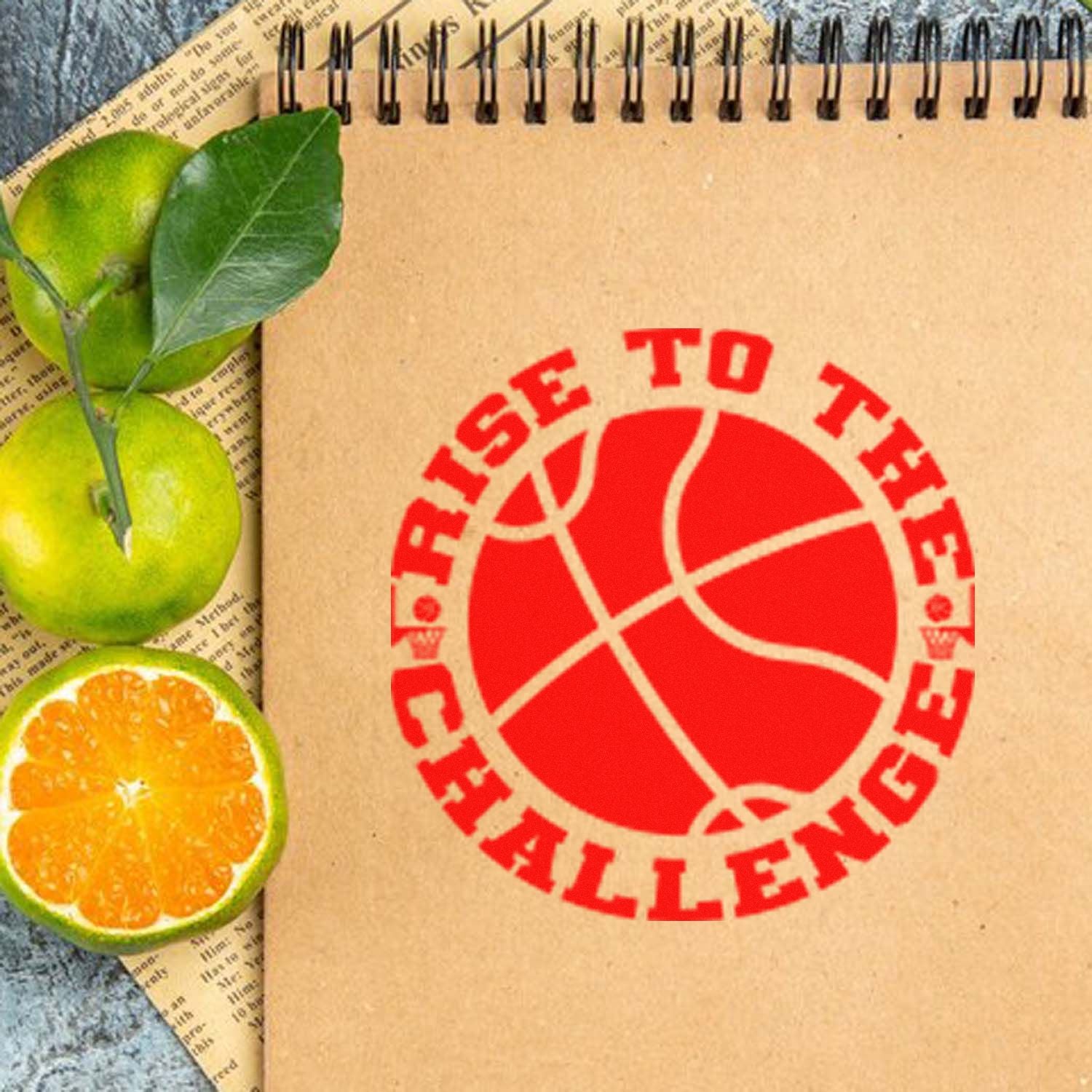 Basketball rubber stamp design reading Rise to the Challenge, ideal for sports-themed crafts, journals, and team motivation.