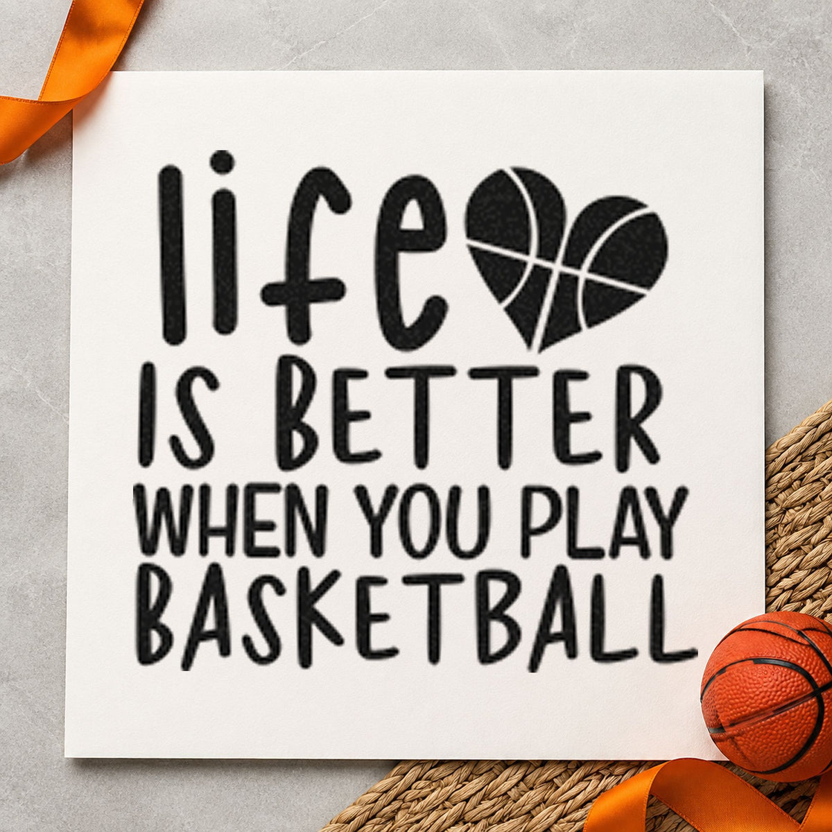 Life Better Playing Basketball craft stamp imprint in black ink on a handmade project, one idea being brace kit gift tags.