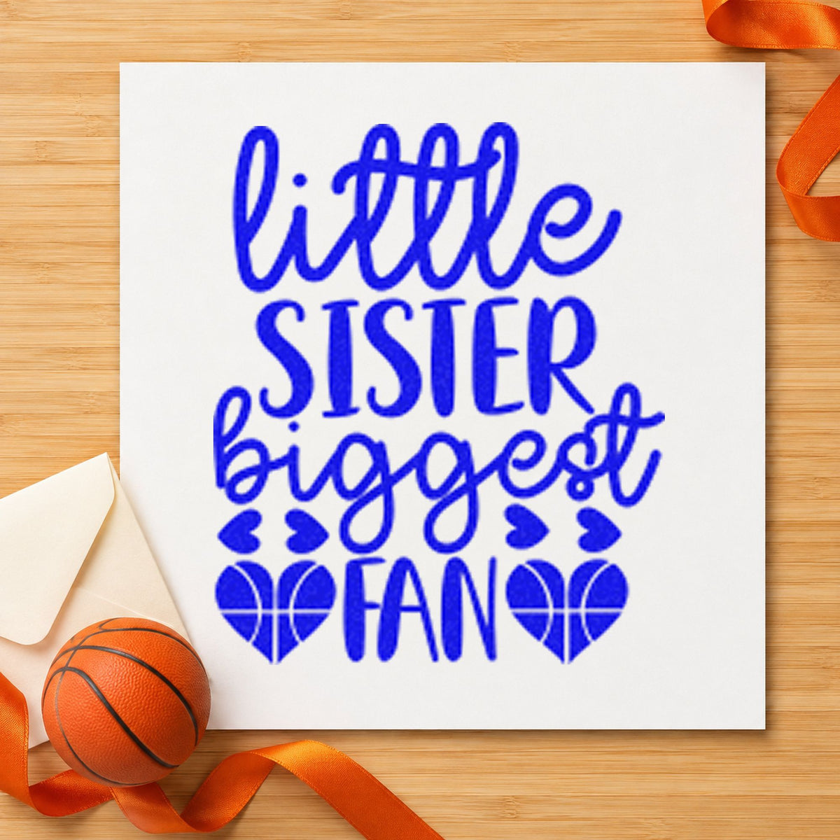 Little Sister Biggest Fan craft stamp in blue ink on cardstock, an easy option for birthday sash printing.