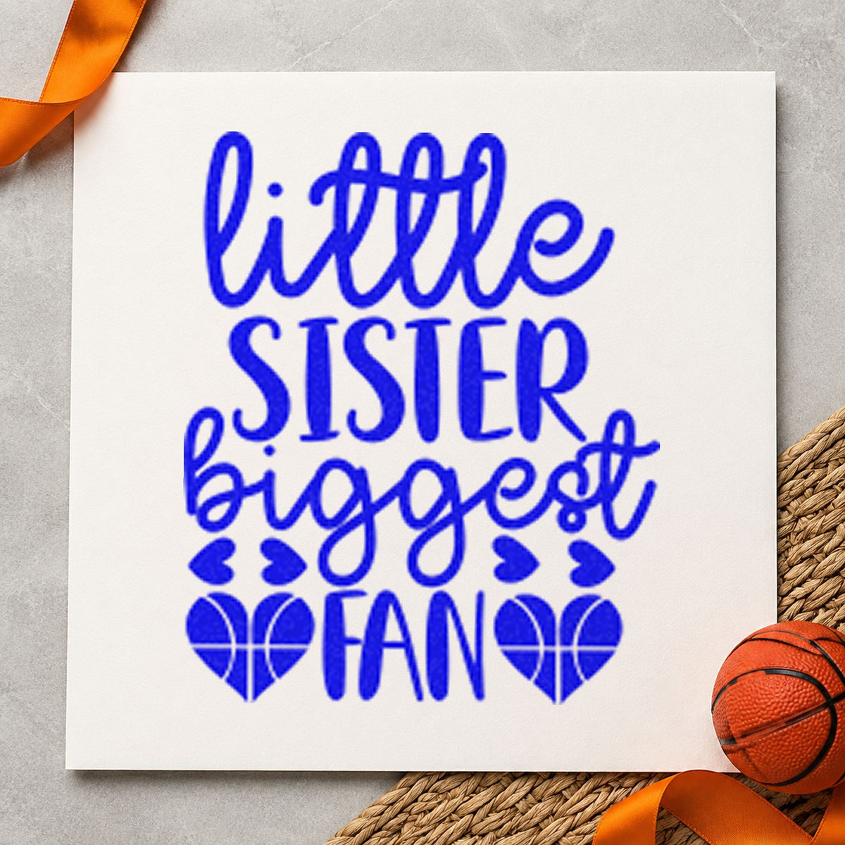 Little Sister Biggest Fan craft stamp imprinted in blue ink on paper, a design suited to framed bedroom corner.