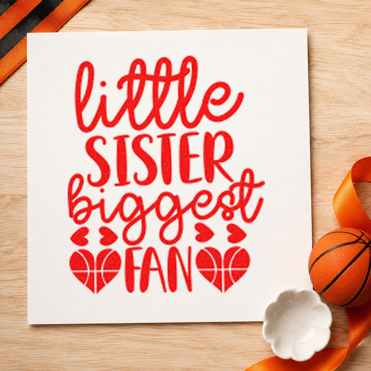 Little Sister Biggest Fan craft stamp imprint in red ink on a handmade project, one idea being group photo cards.
