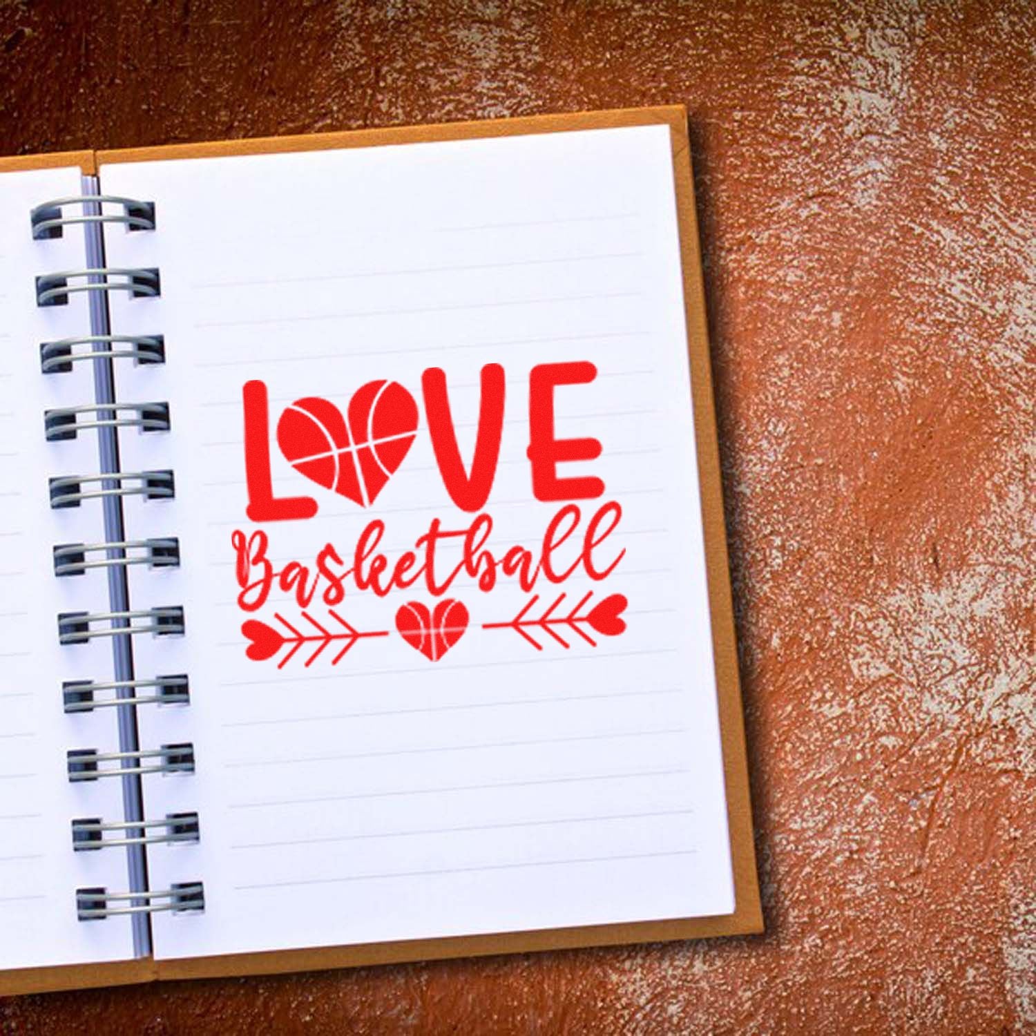 Love Basketball rubber stamp design with heart basketball graphic on a notebook page for sports-themed crafts