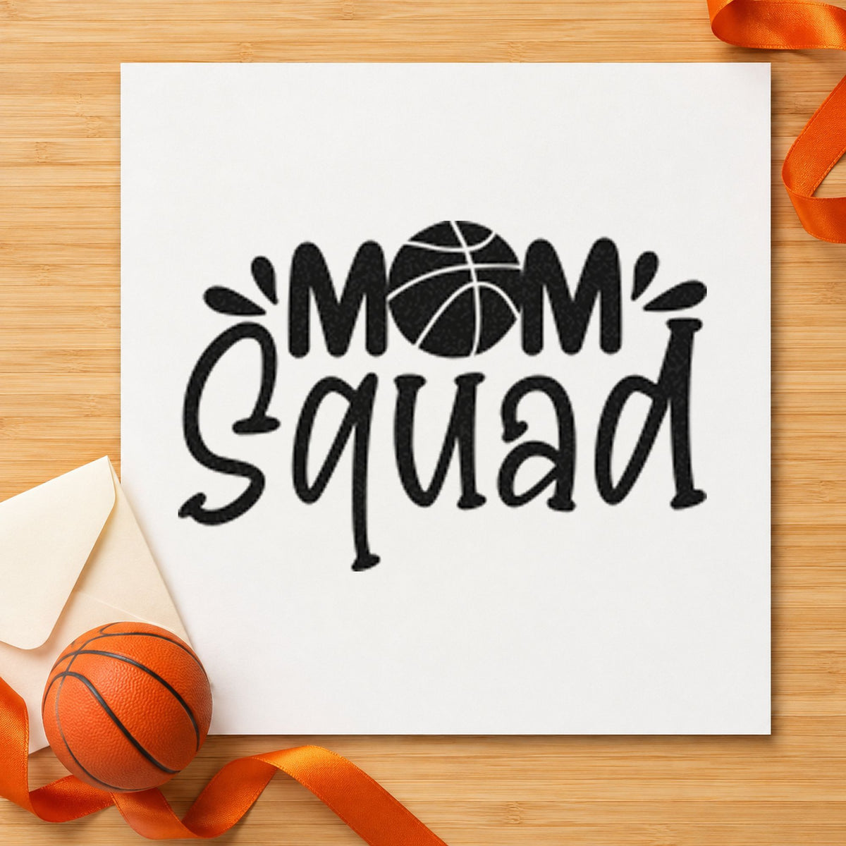 Basketball Mom Squad Lettering craft stamp imprint in black ink on a handmade project, one idea being treat box gift tags.