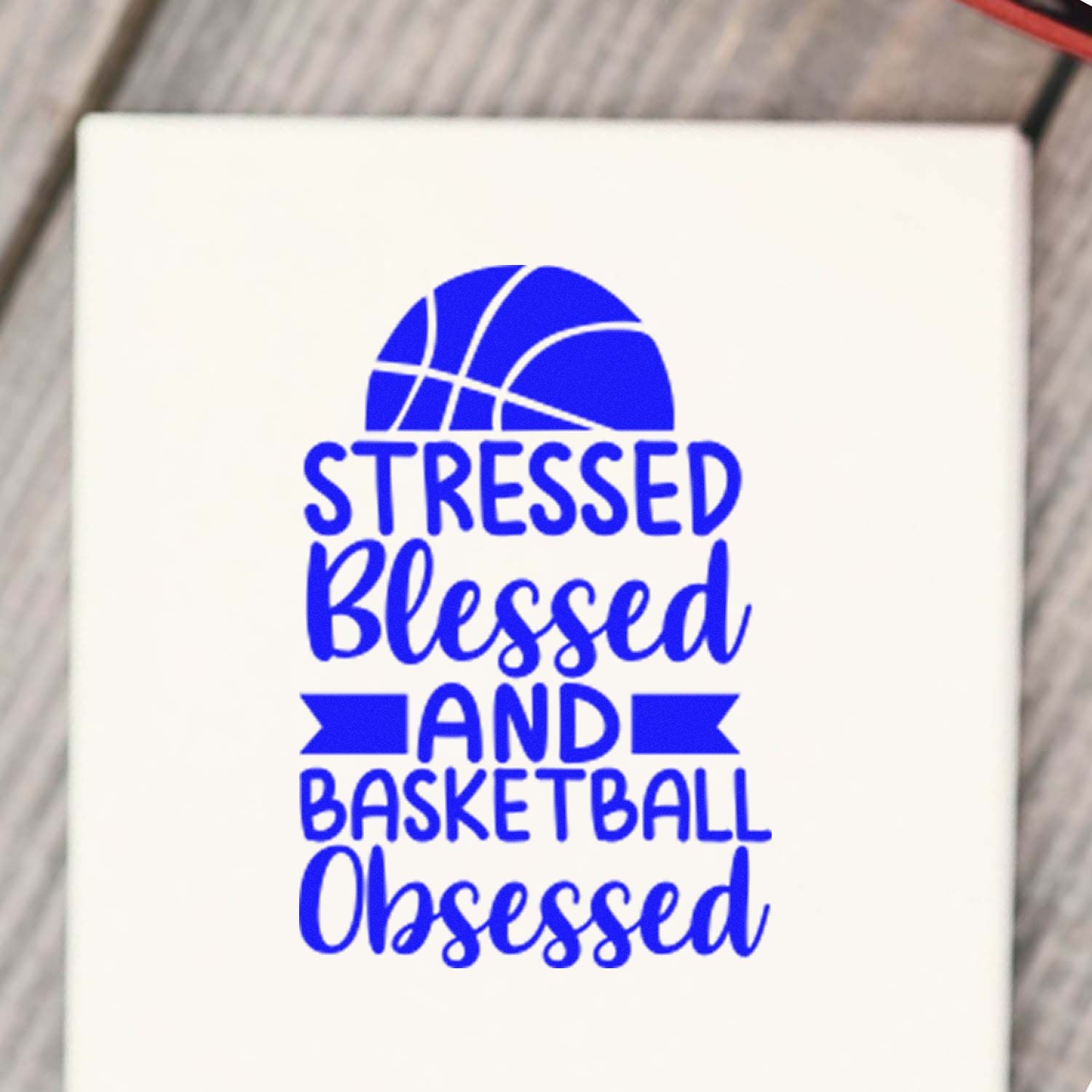 Basketball rubber stamp design with blue text reading Stressed, Blessed and Basketball Obsessed and a basketball graphic.