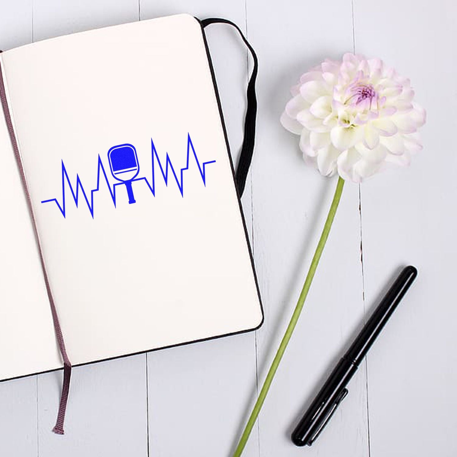 Custom rubber stamp logo with heartbeat line, ideal for medical branding and personalized stationery.