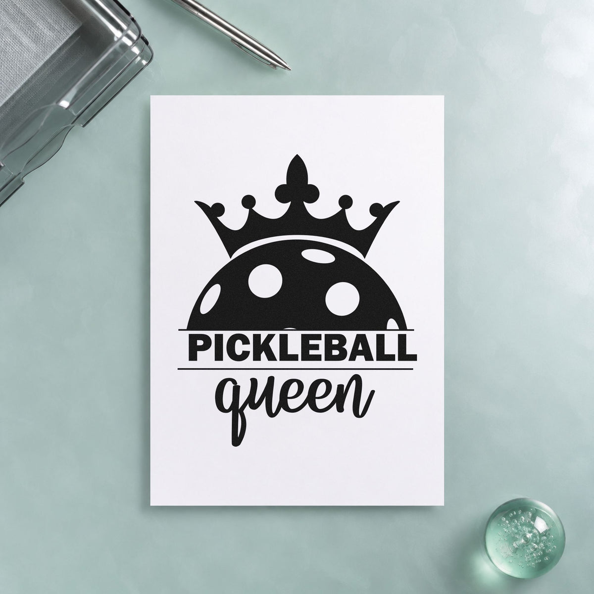 Pickleball Queen Crowned Ball craft stamp imprint in black ink on a handmade project, one idea being birthday gift tags.