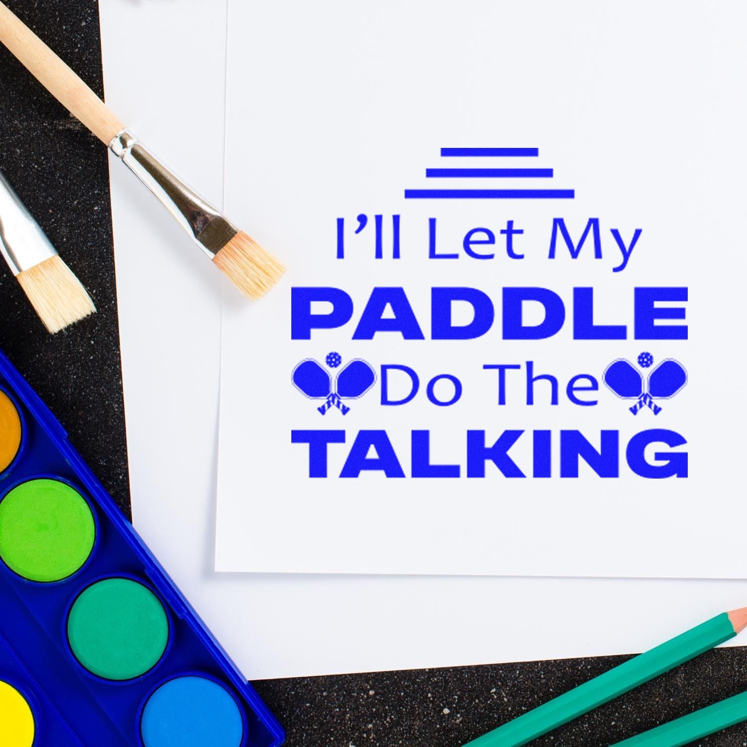 Pickleball rubber stamp design with the quote Ill let my paddle do the talking for craft projects.