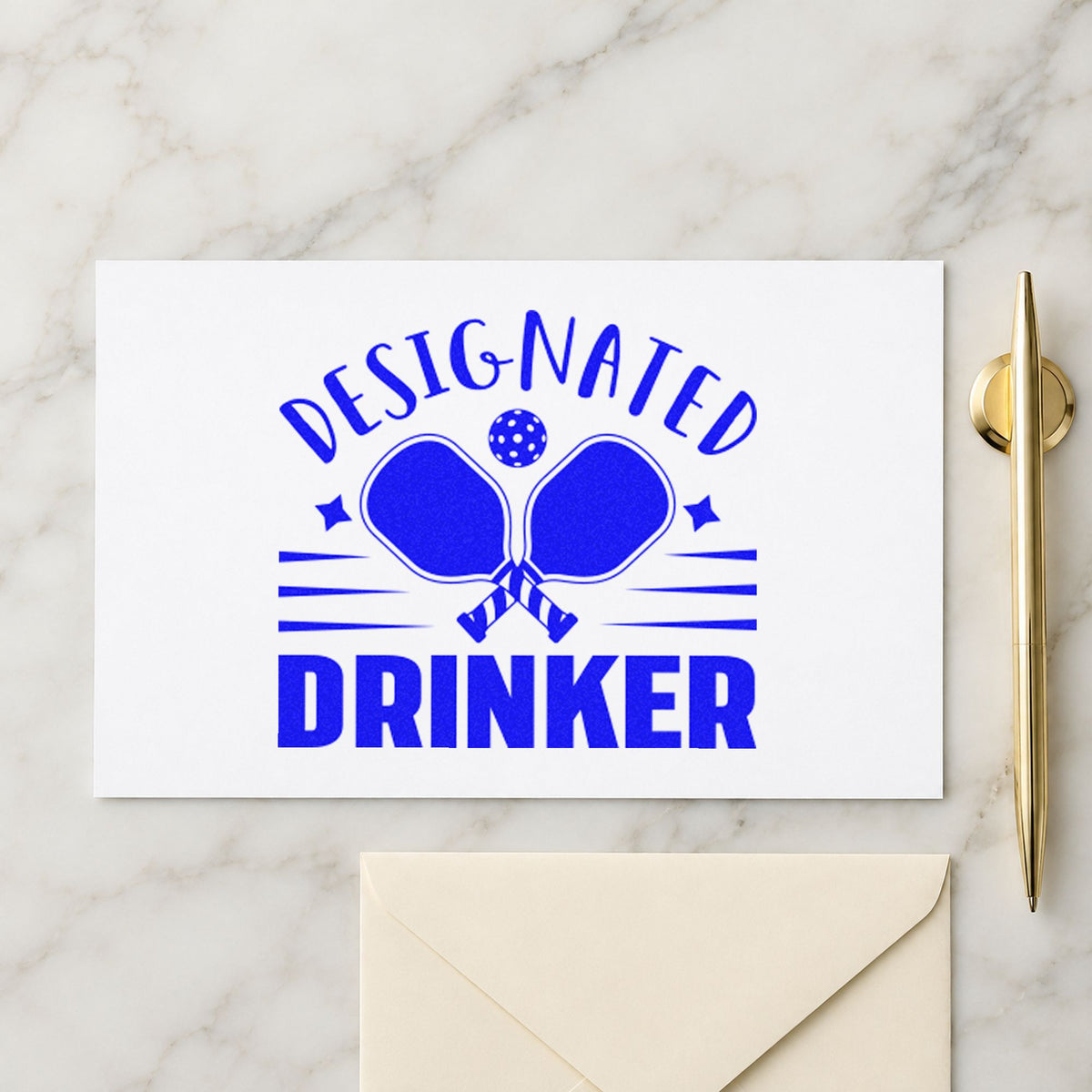 Designated Drinker Pickleball Paddles craft stamp in blue ink on cardstock, an easy option for bar towel printing.