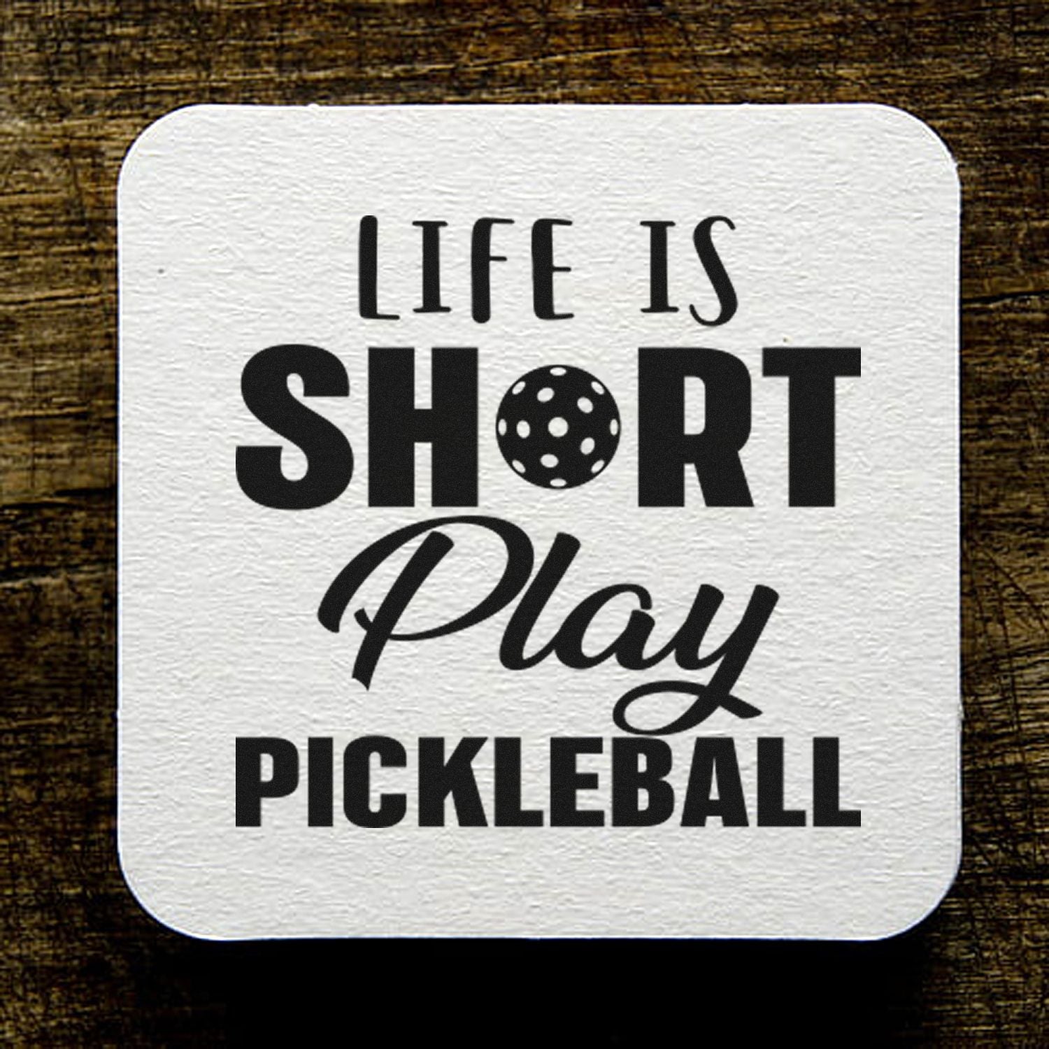 Life is short, play pickleball rubber stamp design for sports crafts, gifts, and pickleball fans.