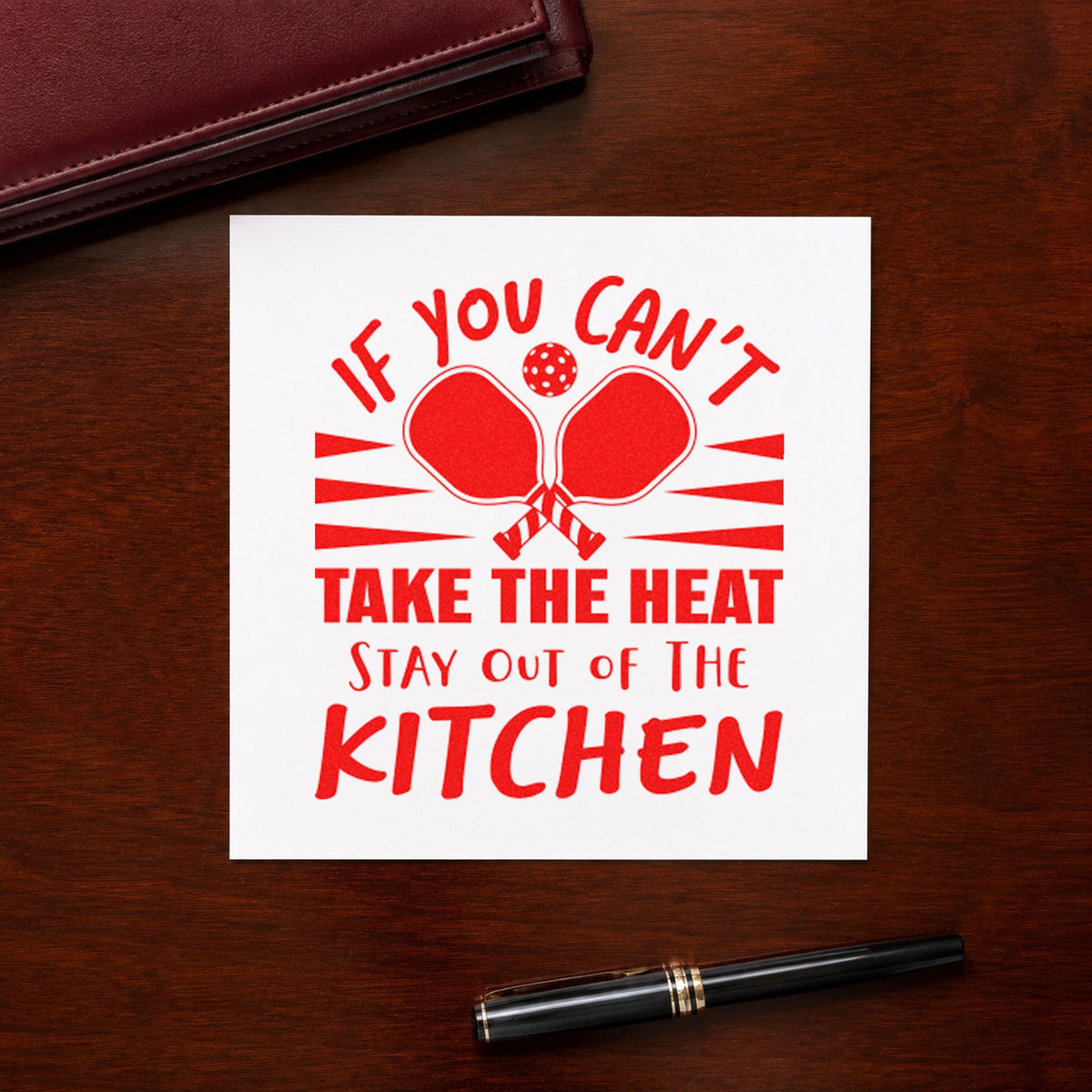 Heat Stay Out Kitchen craft stamp imprint in red ink on a handmade project, one idea being recipe share cards.