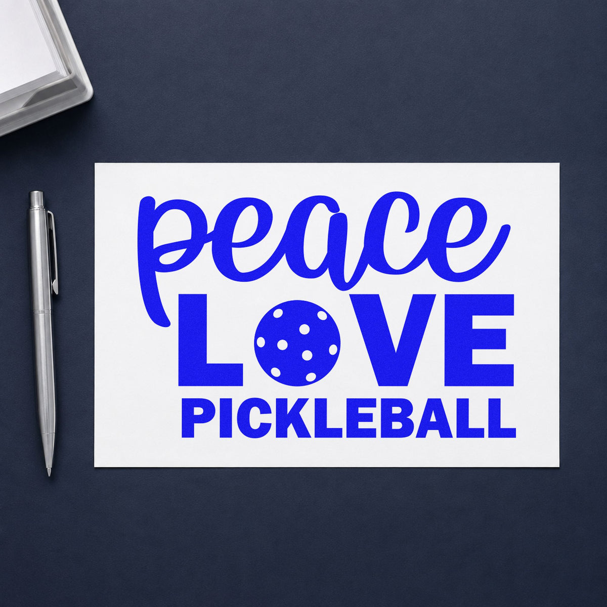 Peace Love Pickleball Lettering craft stamp in blue ink on cardstock, an easy option for event banner printing.