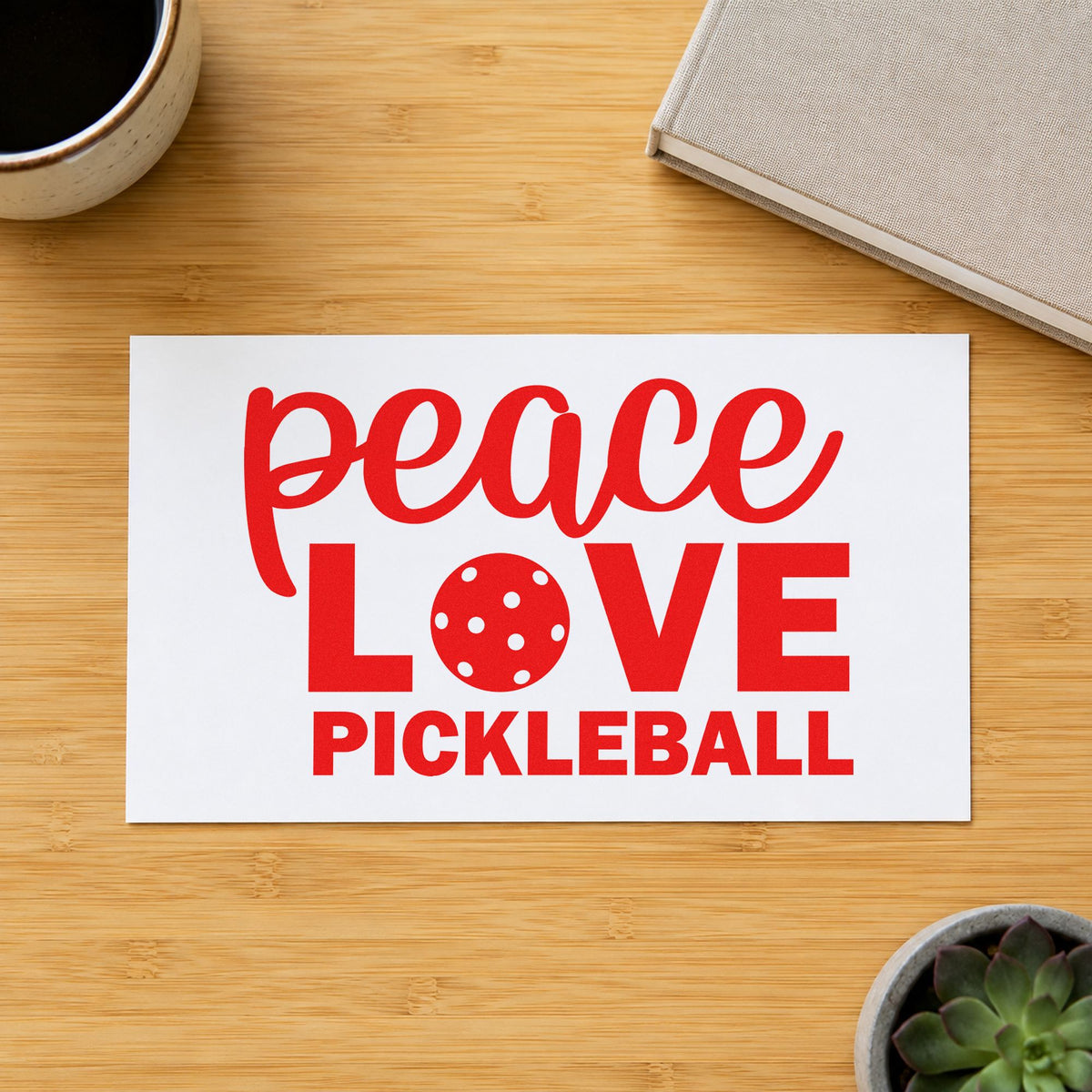 Peace Love Pickleball Lettering craft stamp imprint in red ink on a handmade project, one idea being raffle ticket cards.