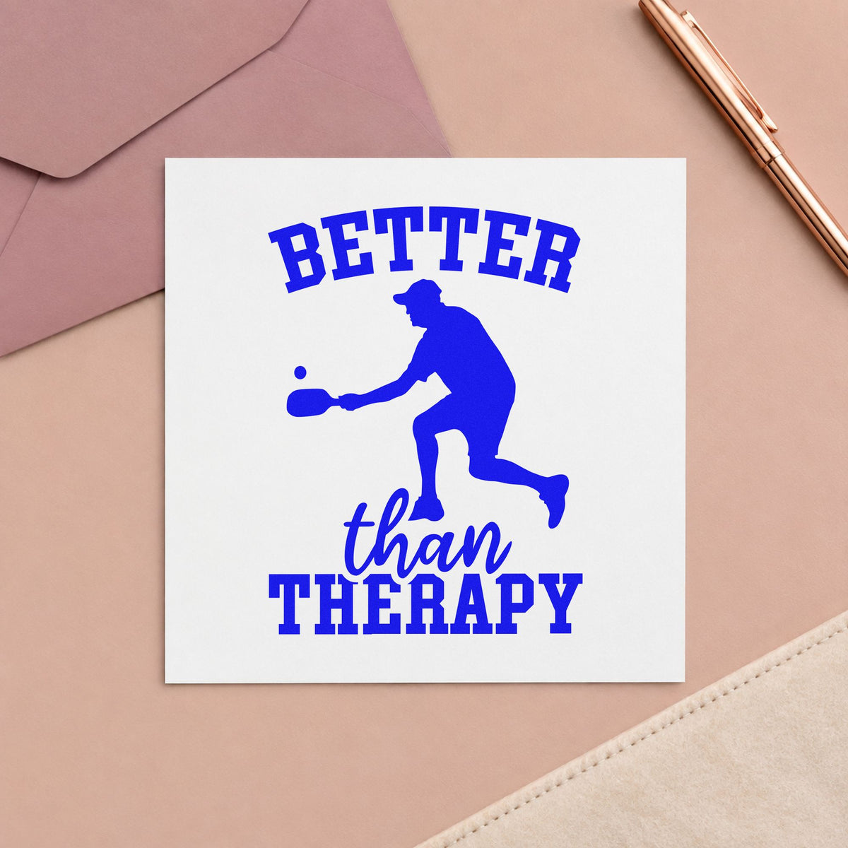 Better Than Therapy Pickleball craft stamp imprinted in blue ink on paper, a design suited to framed hall hook.