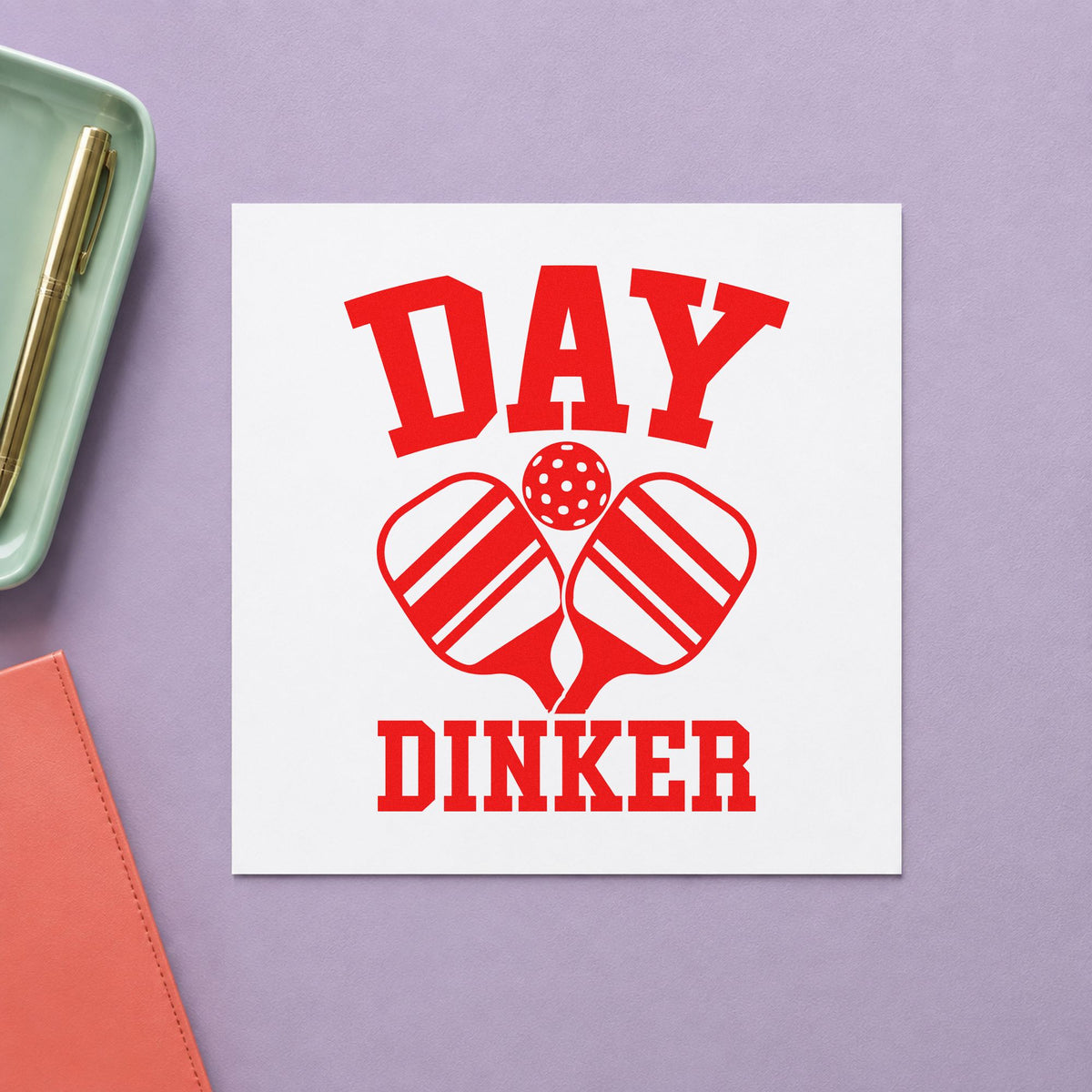 Day Dinker Crossed Paddles rubber stamp shown in red ink, stamped for projects such as bin loaner labels.